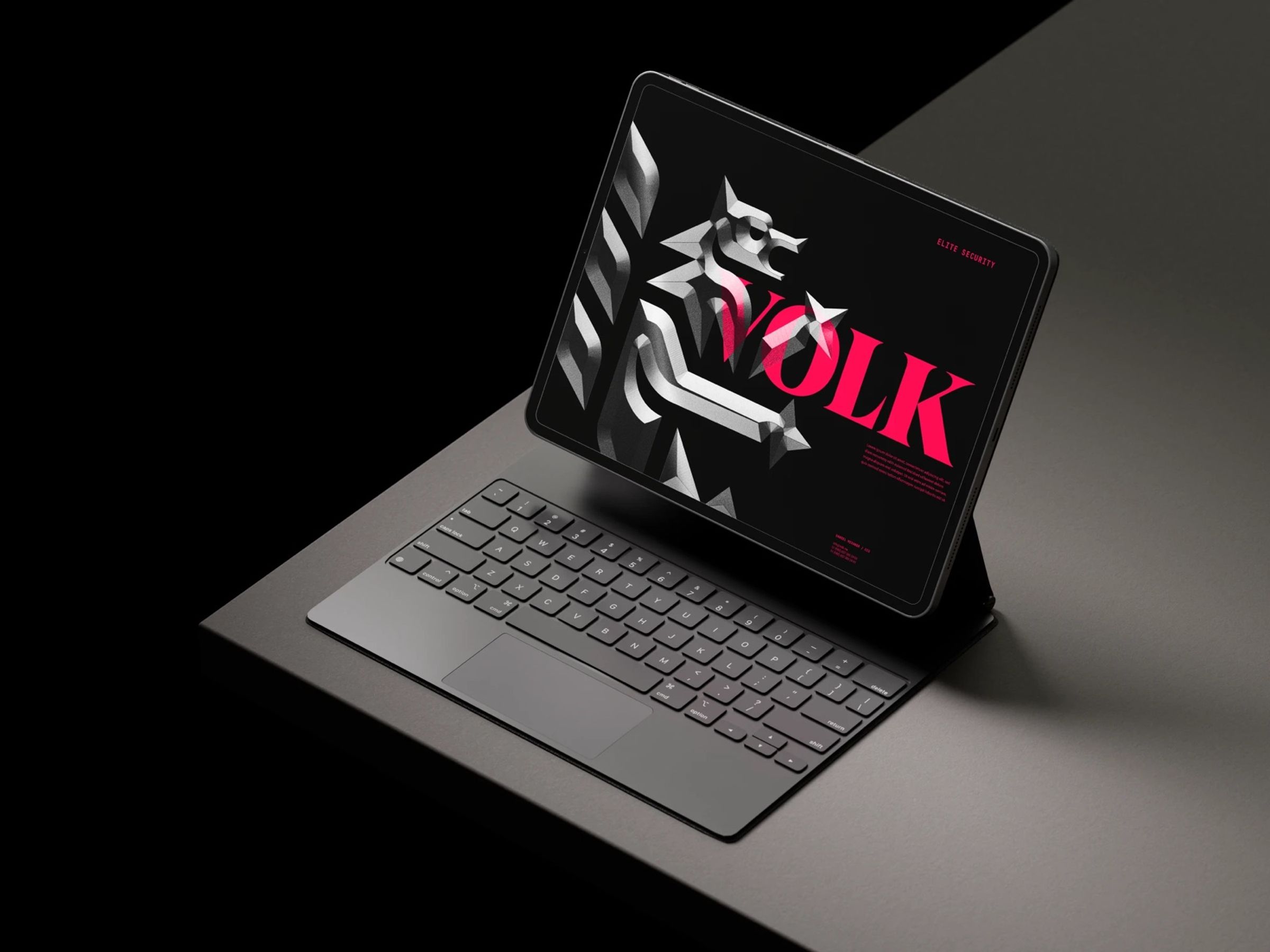 Identidad de Volk en una tableta: lobo tridimensional y logotipo magenta