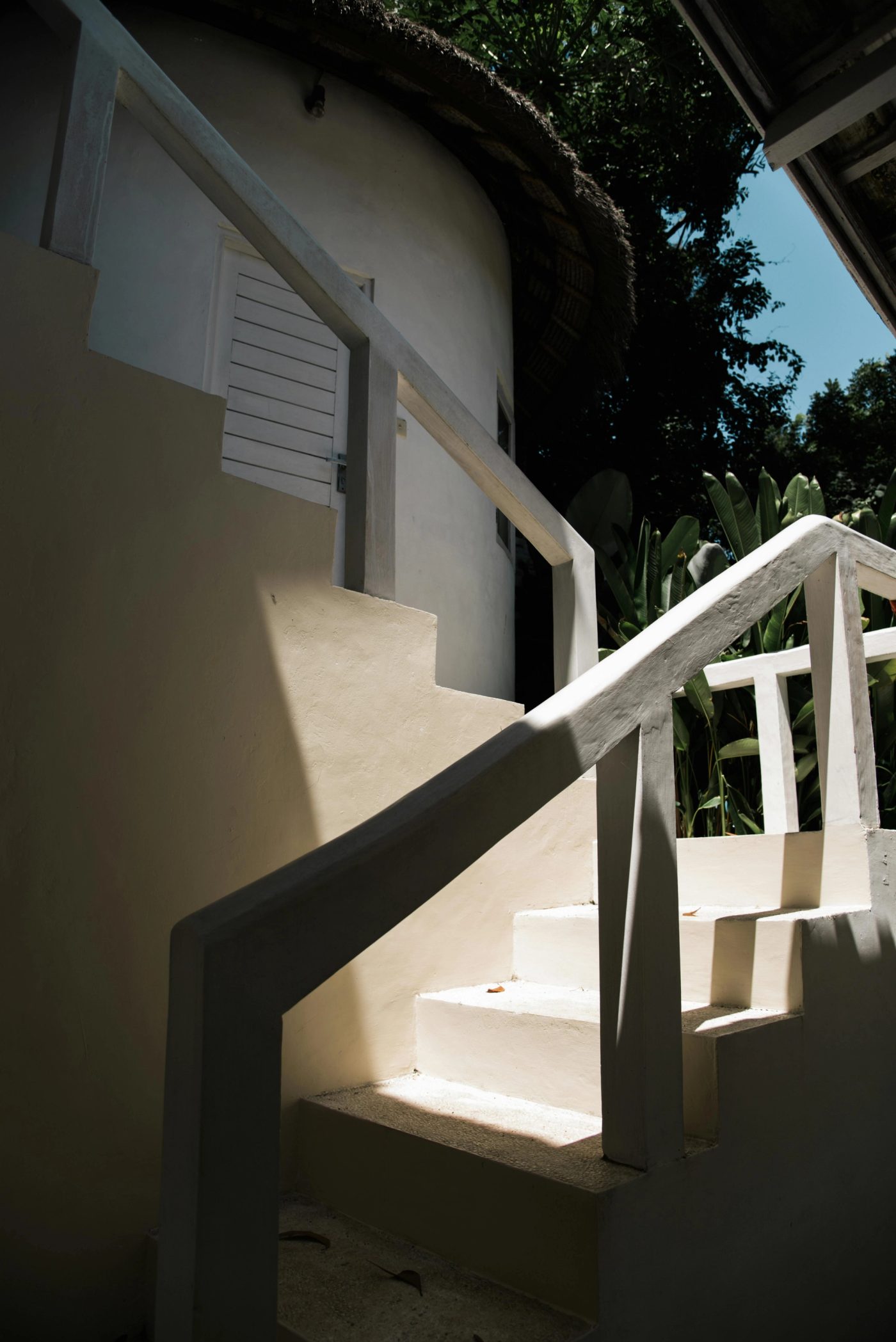 Footer column first image, shows a white staircase