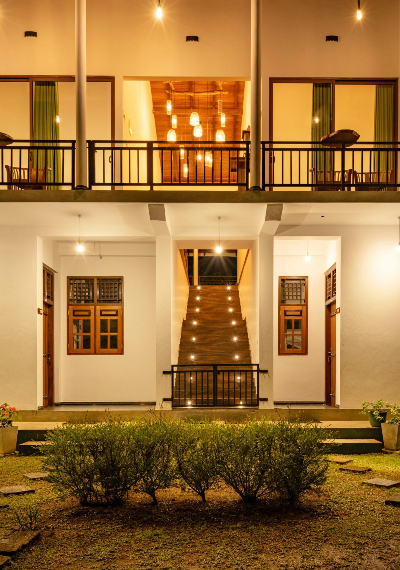 Jazcaf guesthouse promo footer image, features the guesthouse yard and stairs