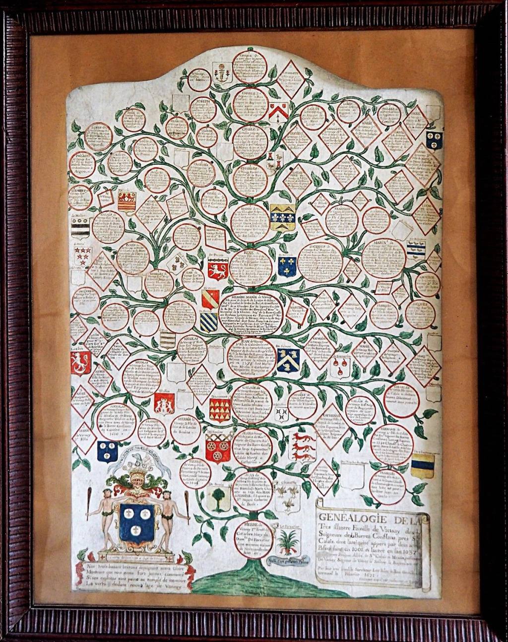Framed hand-painted family tree decorated with coats of arms