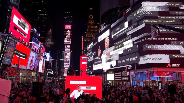 Times Square billboards displaying toxic social media comments as part of SK-II #NoCompetition campaign