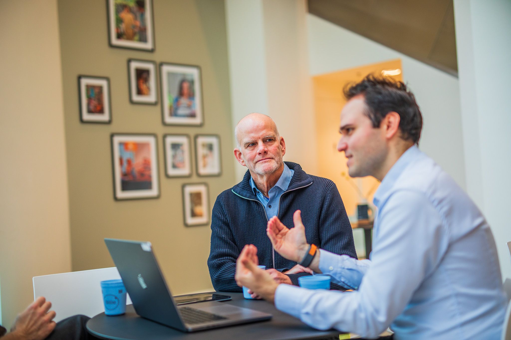 Two men in conversation.