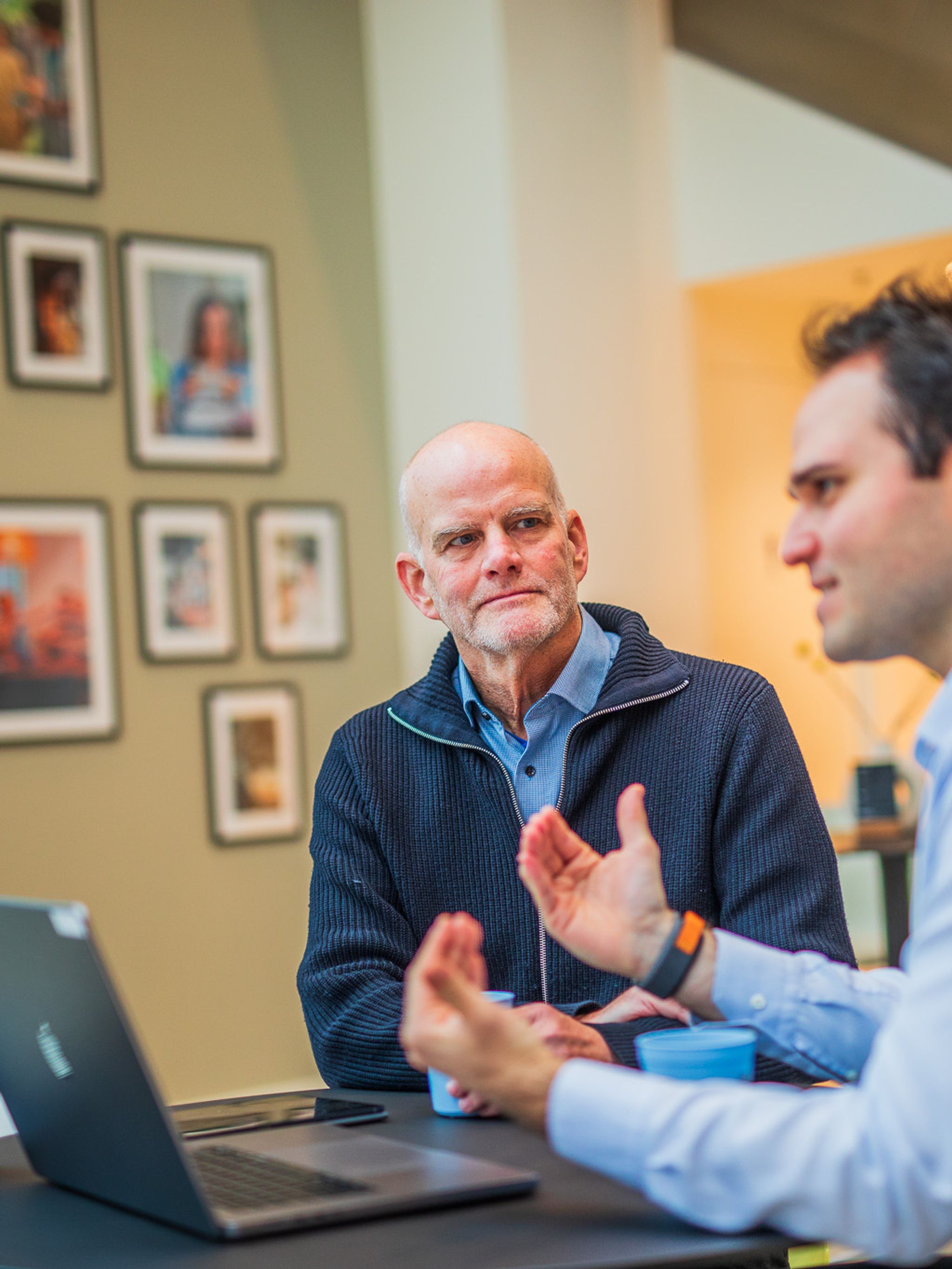 Two men in conversation.