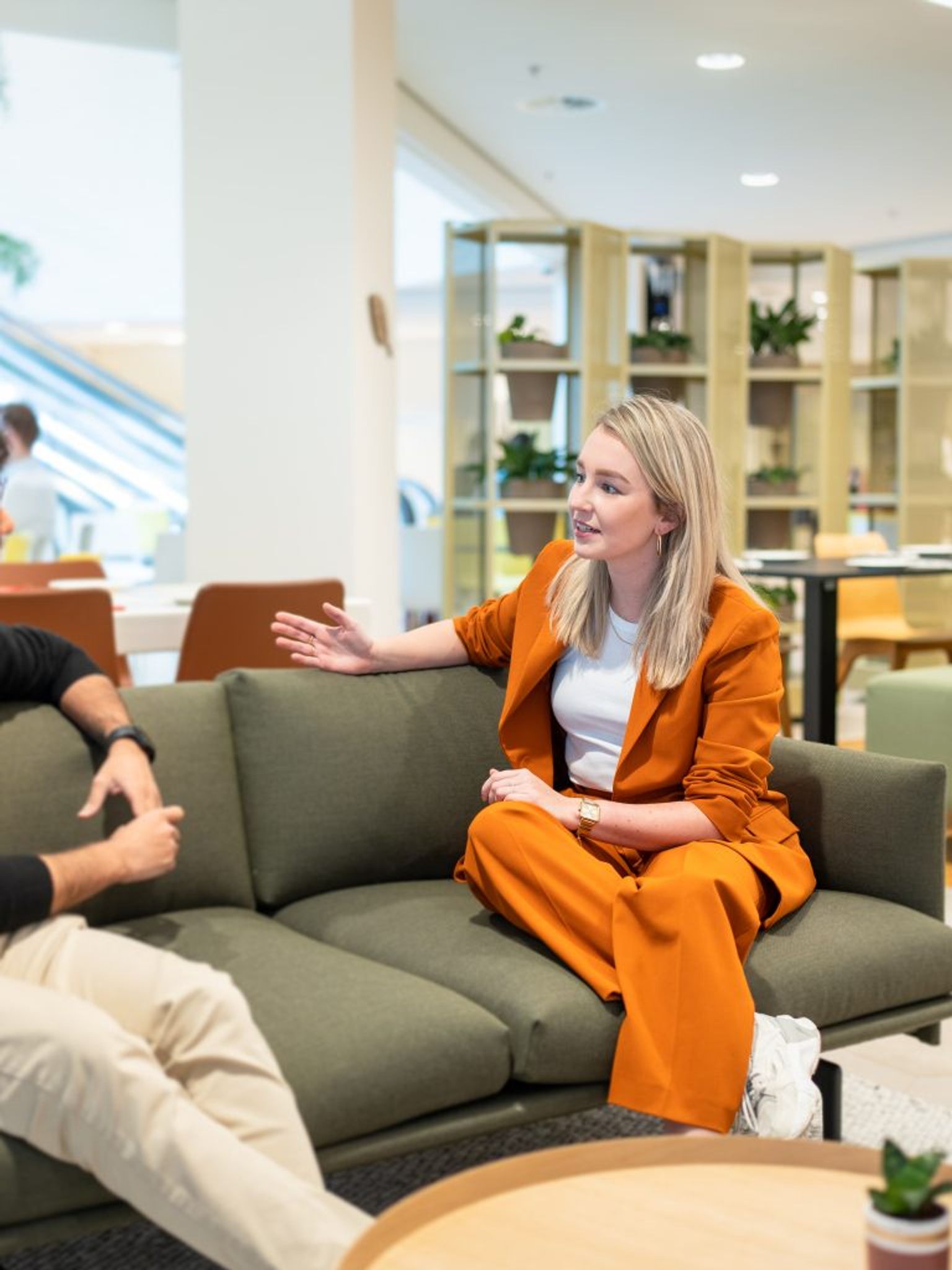 Two colleagues sitting on a couch