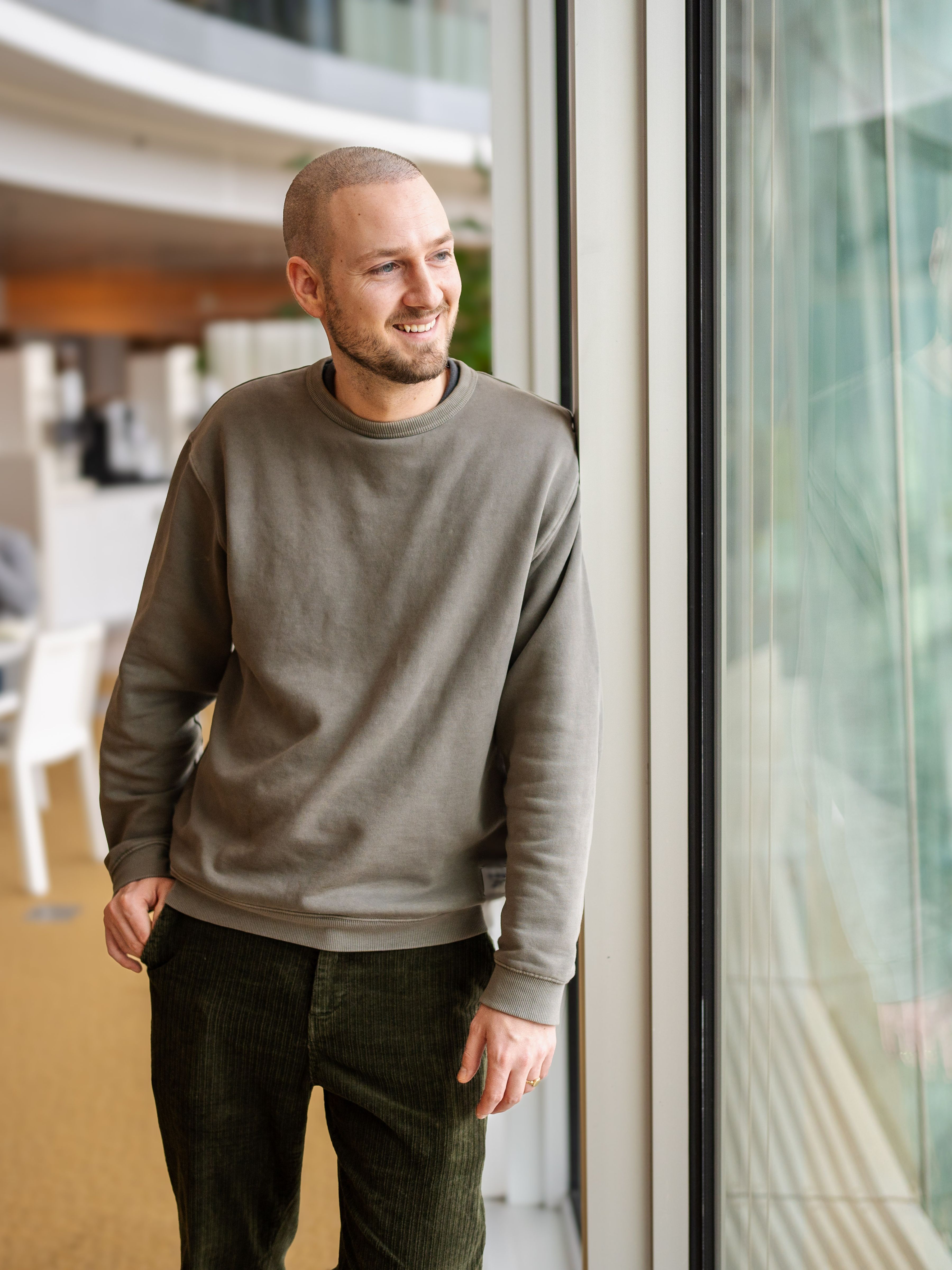 man looking out of the window