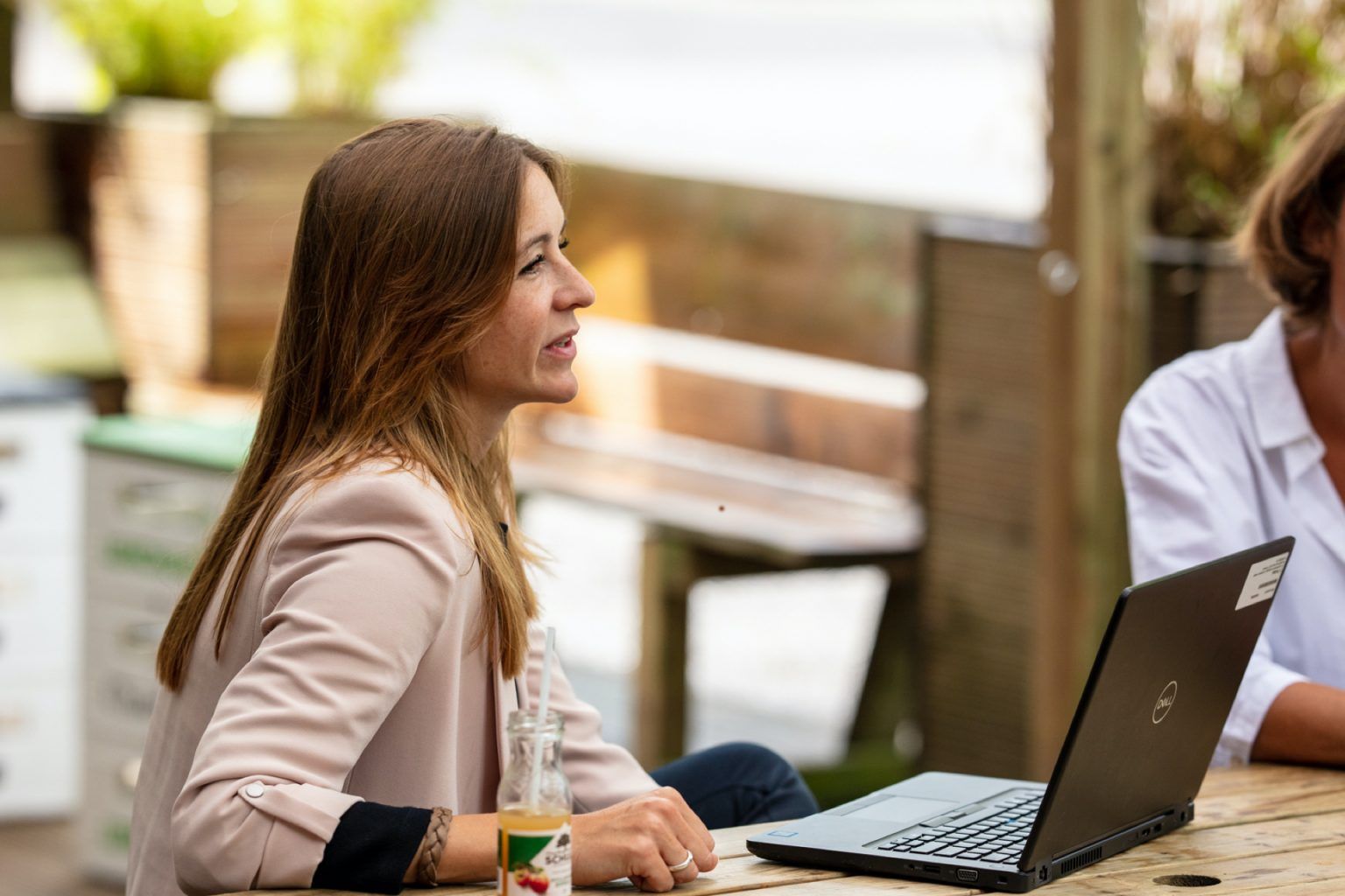 Woman behind her laptop