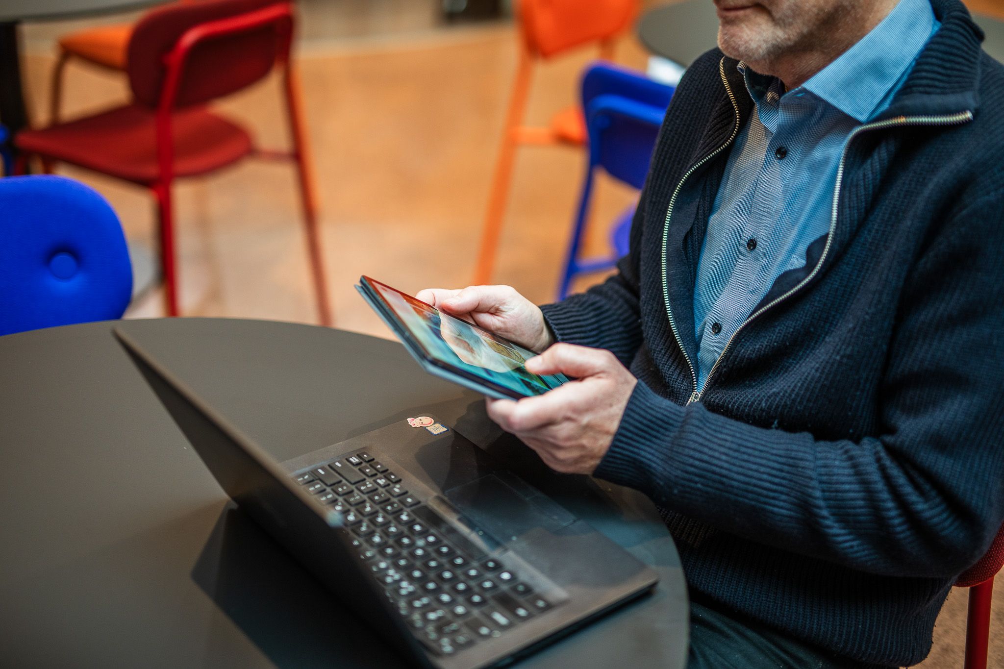 Men with tablet and laptop