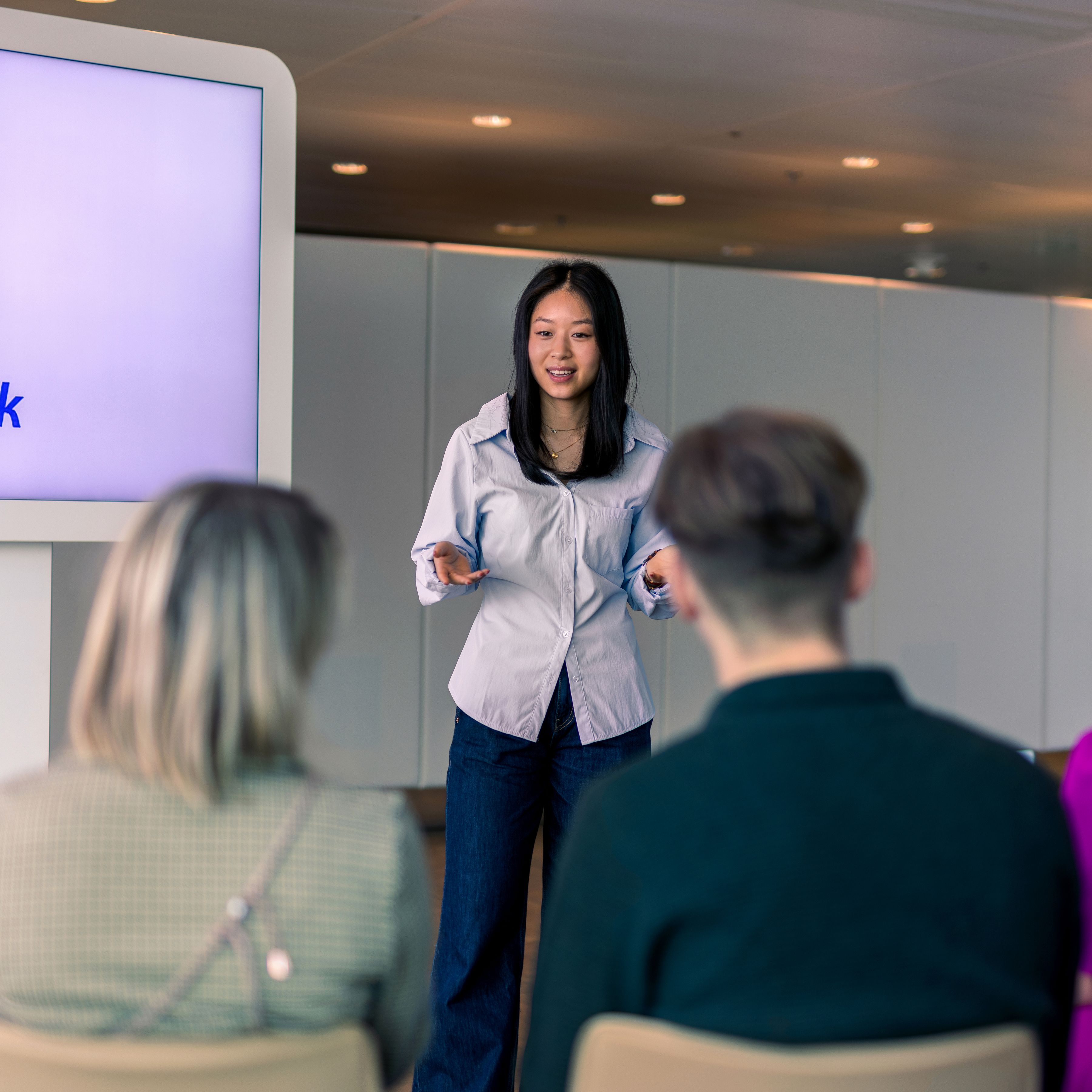 Woman is giving a presentation