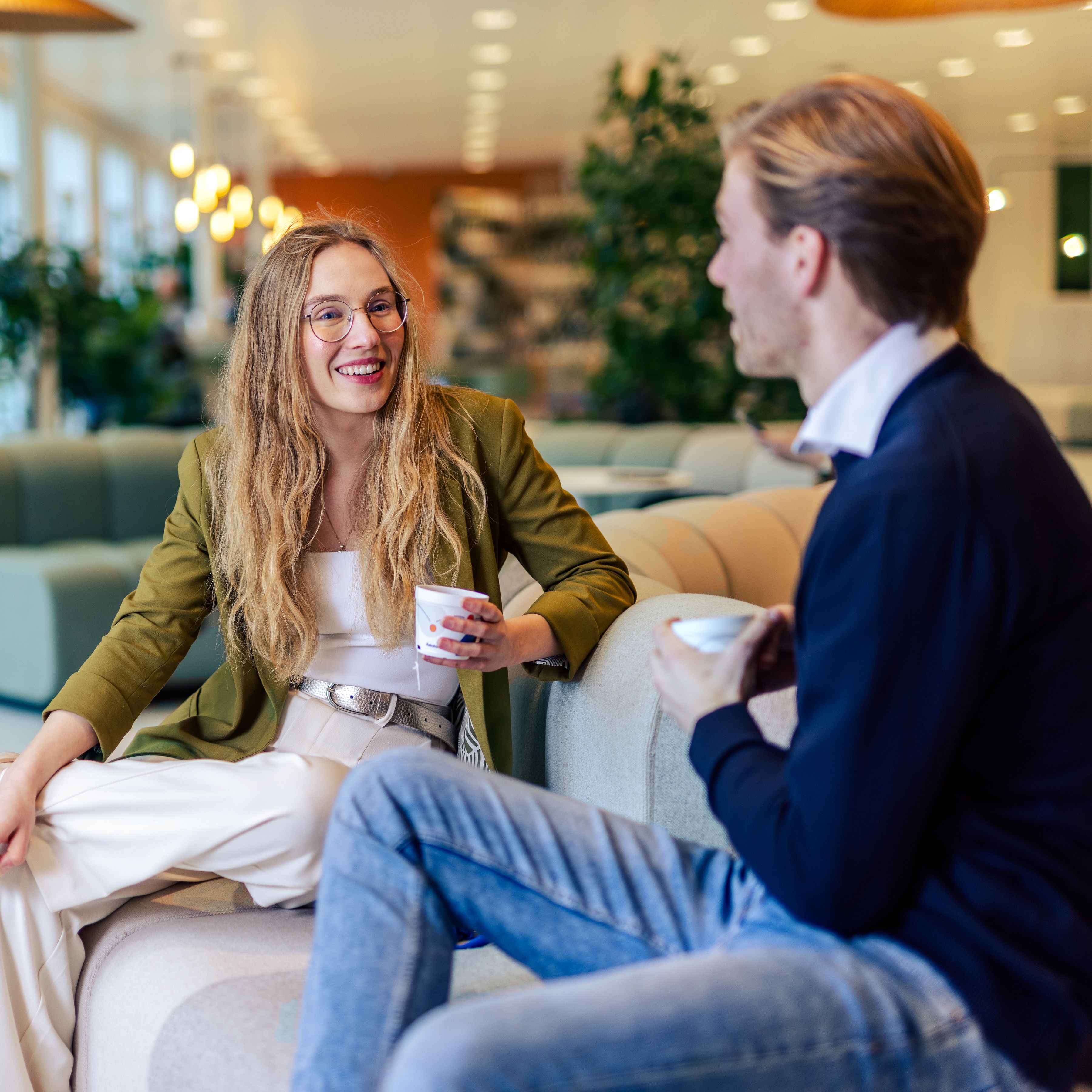 Two colleagues having a coffee