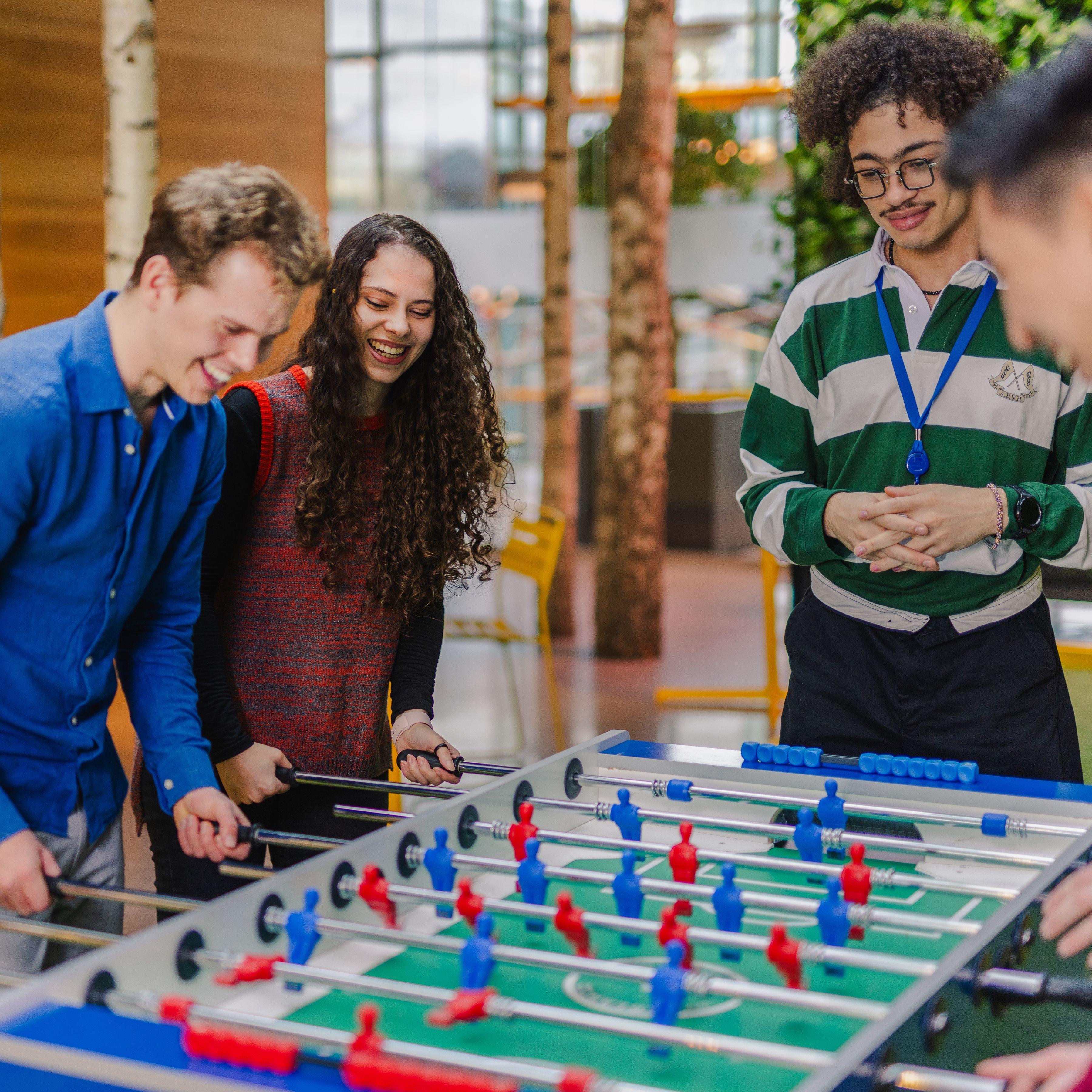 People playing table football