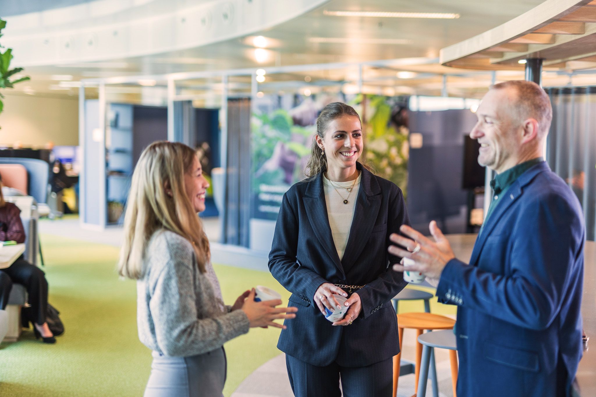 Colleagues chatting together