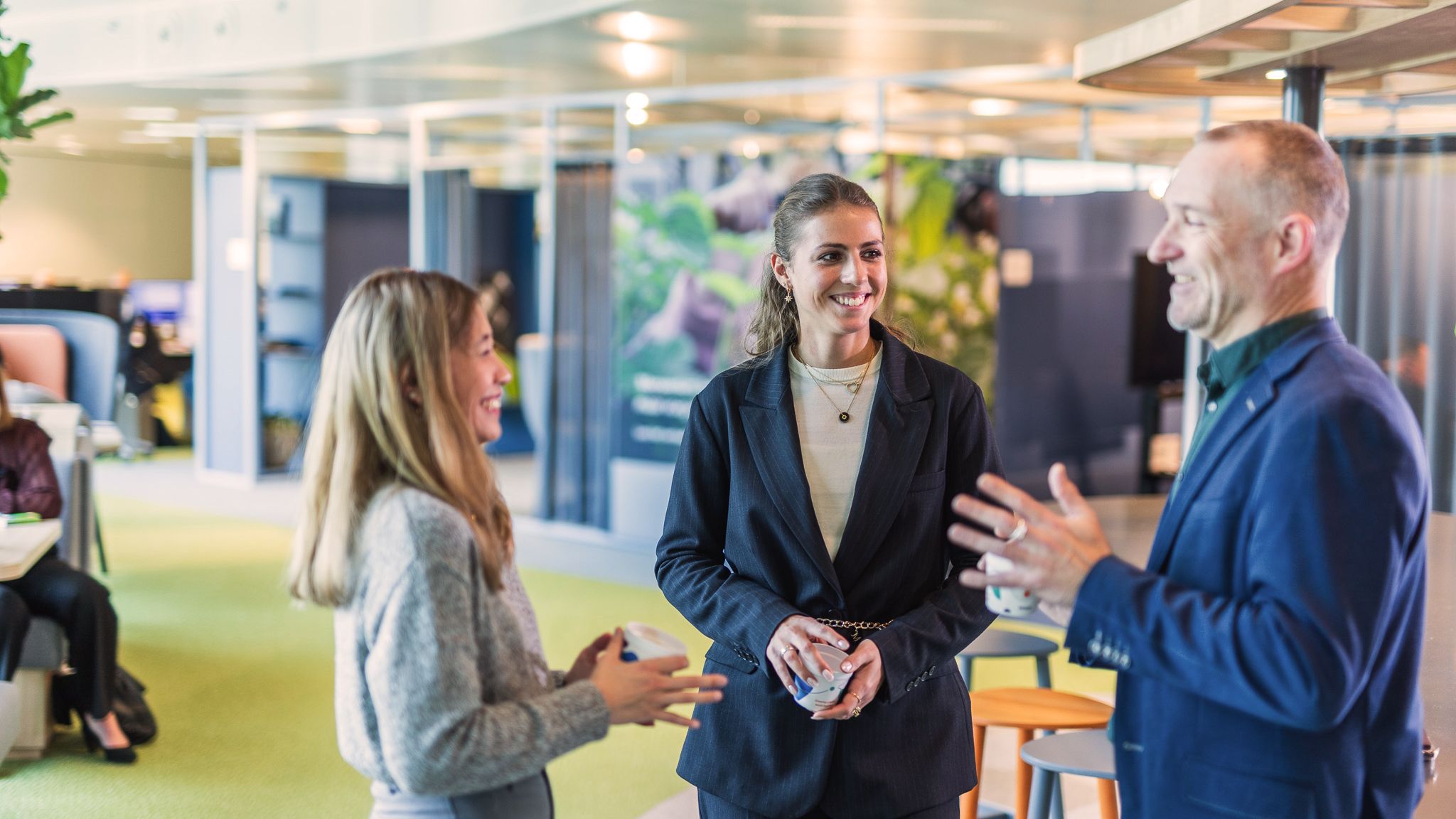 Colleagues chatting together