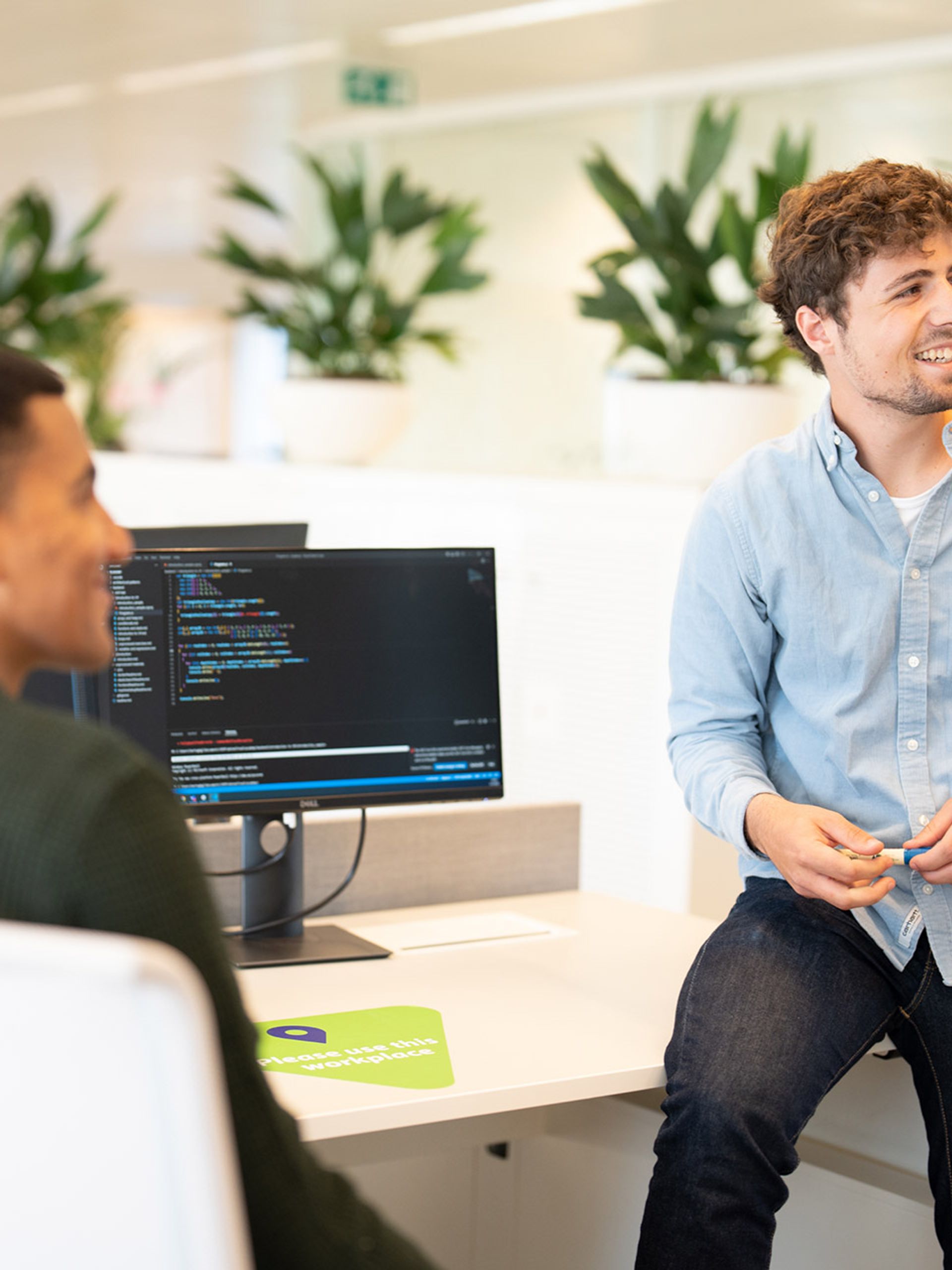 Two colleagues having a conversation