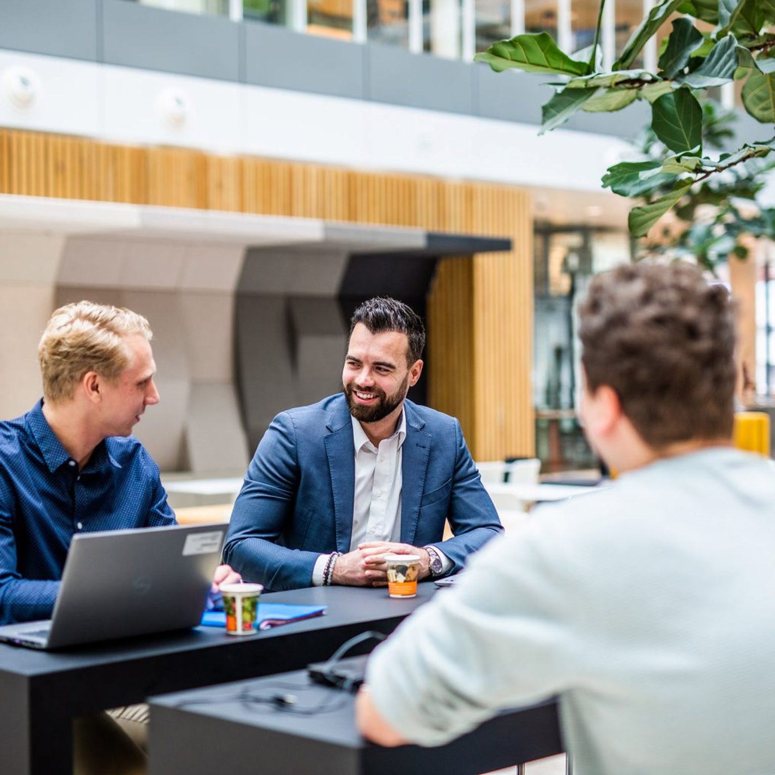 Two young women smiling and talking