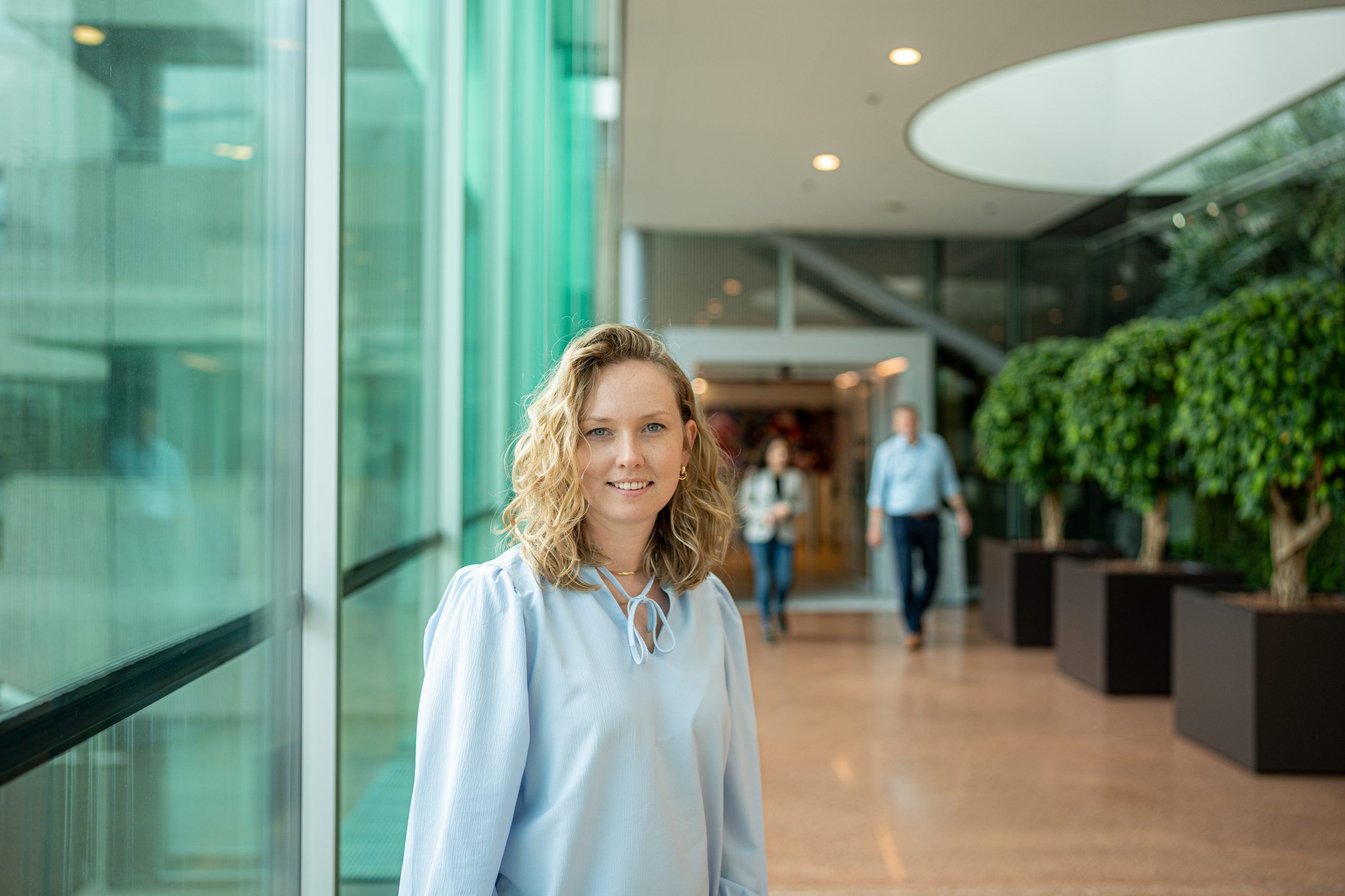 Sabina Pieterse standing at a window