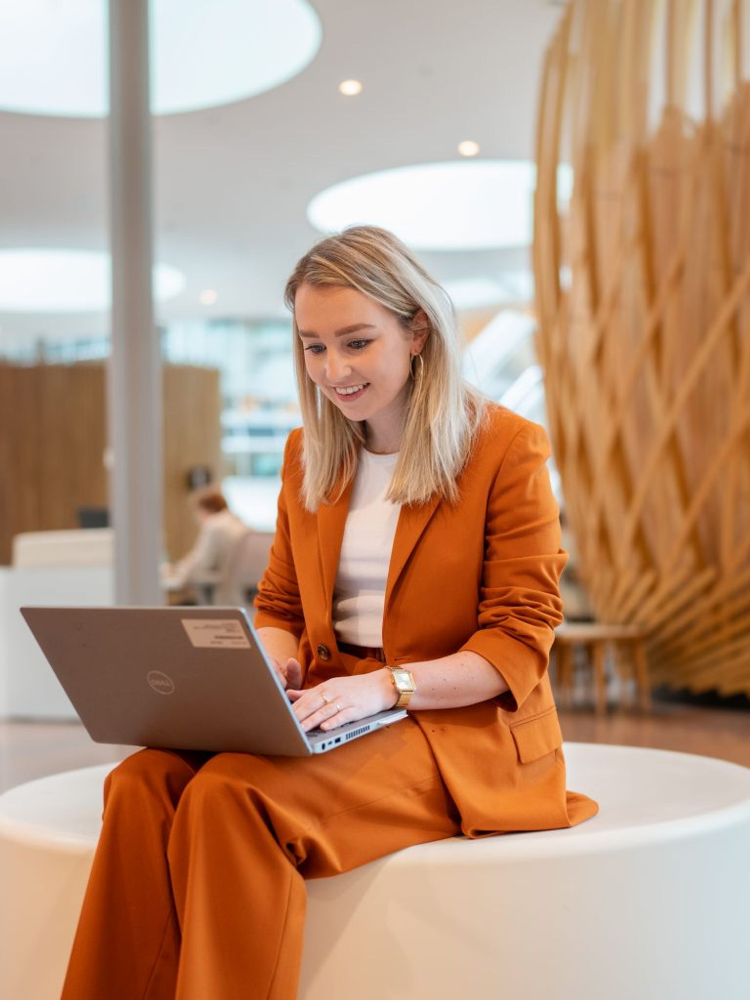 Young woman working on her laptop