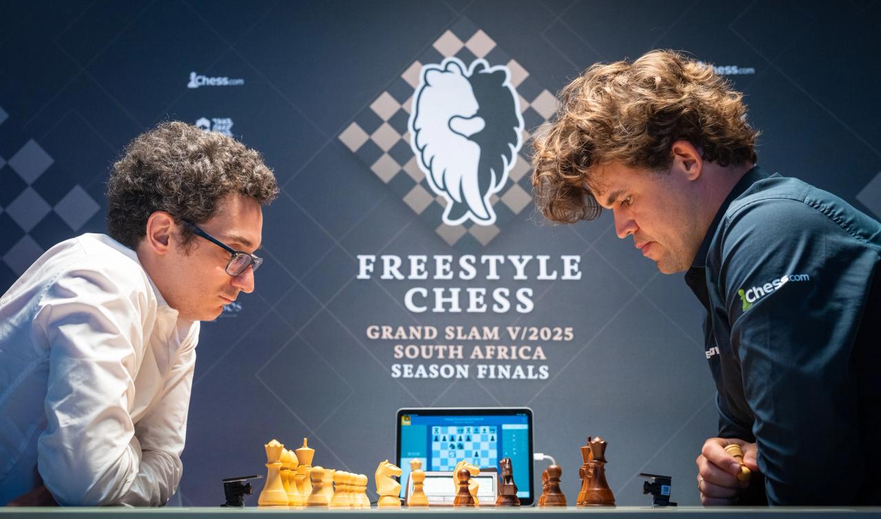 GMs Fabiano Caruana and tour champion Magnus Carlsen.