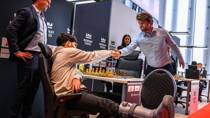 Thumbnail for article: Time To Put Your Feet Up, Firouzja: Injured Star Kicks Carlsen On Day 1 Of Norway Chess