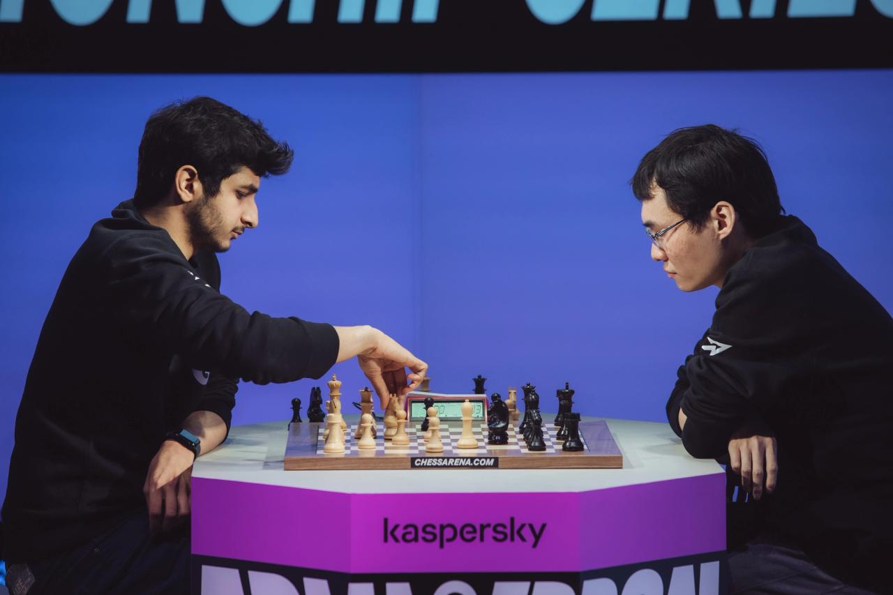 Vidit Santosh Gujrathi GM touching a chess pieces in Day 3 Armageddon Chess Series against GM Yangyi Yu