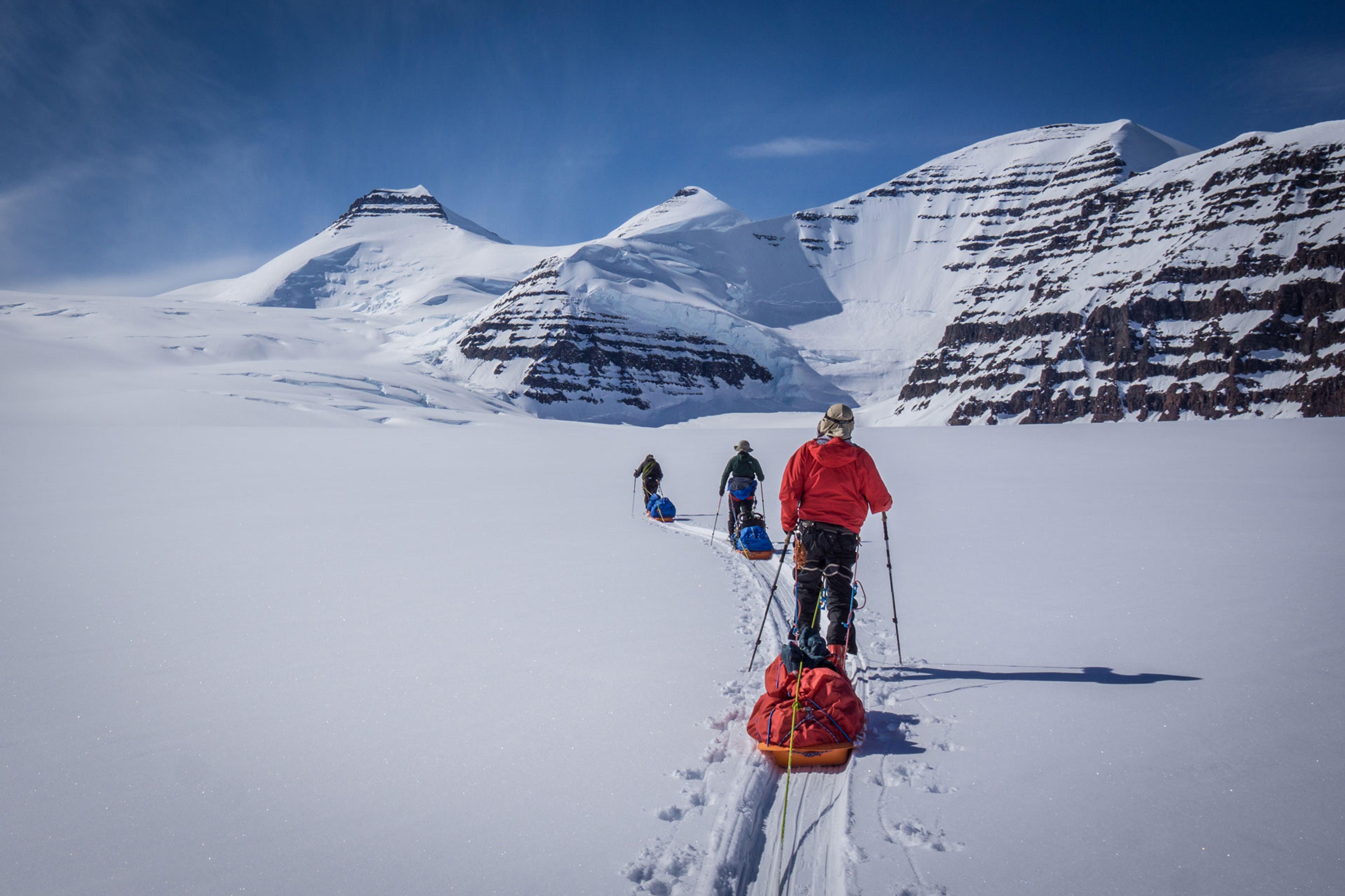 The team heading higher up the glacier to set up camp