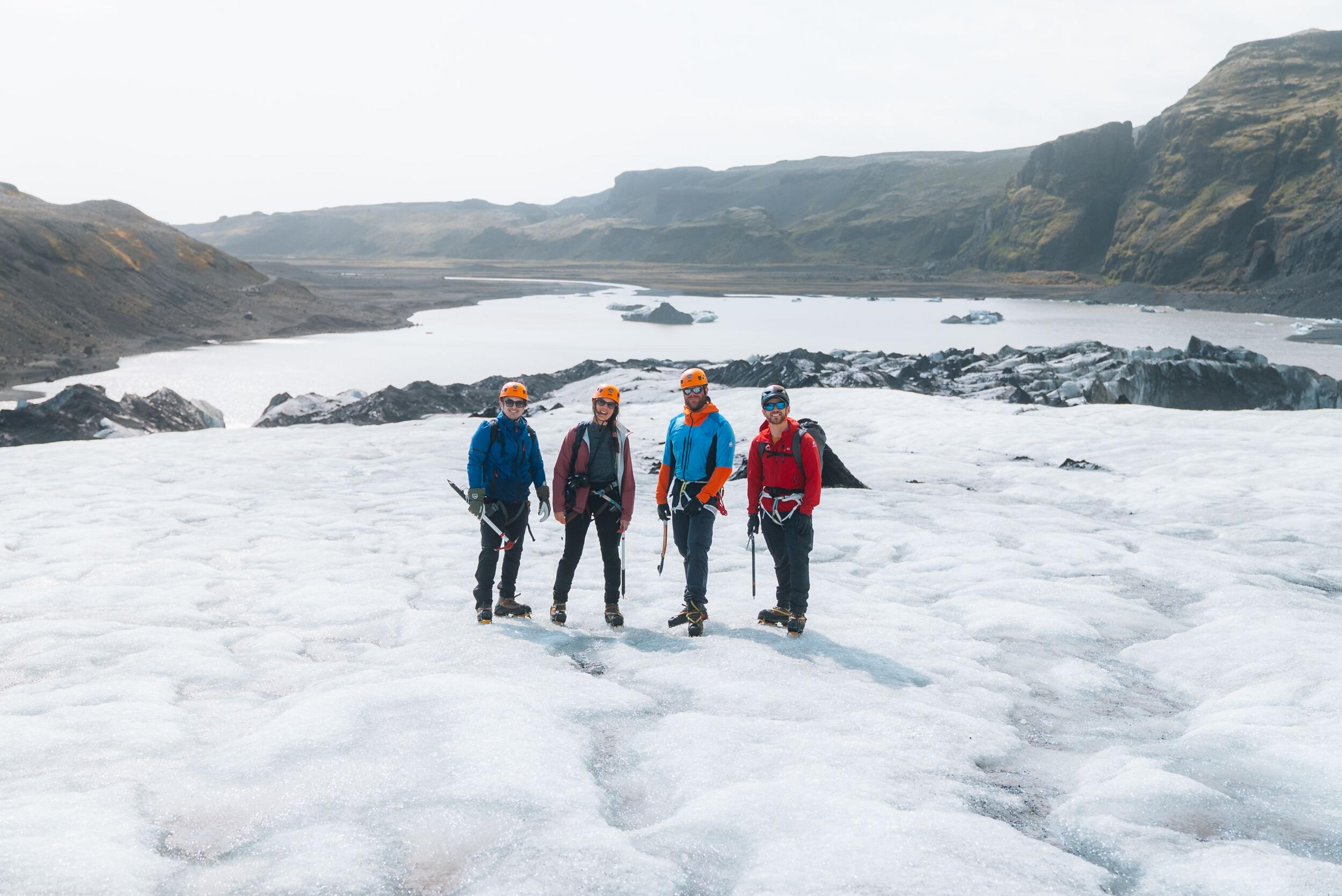 People hiking up Sólheimajökull on a glacier walk