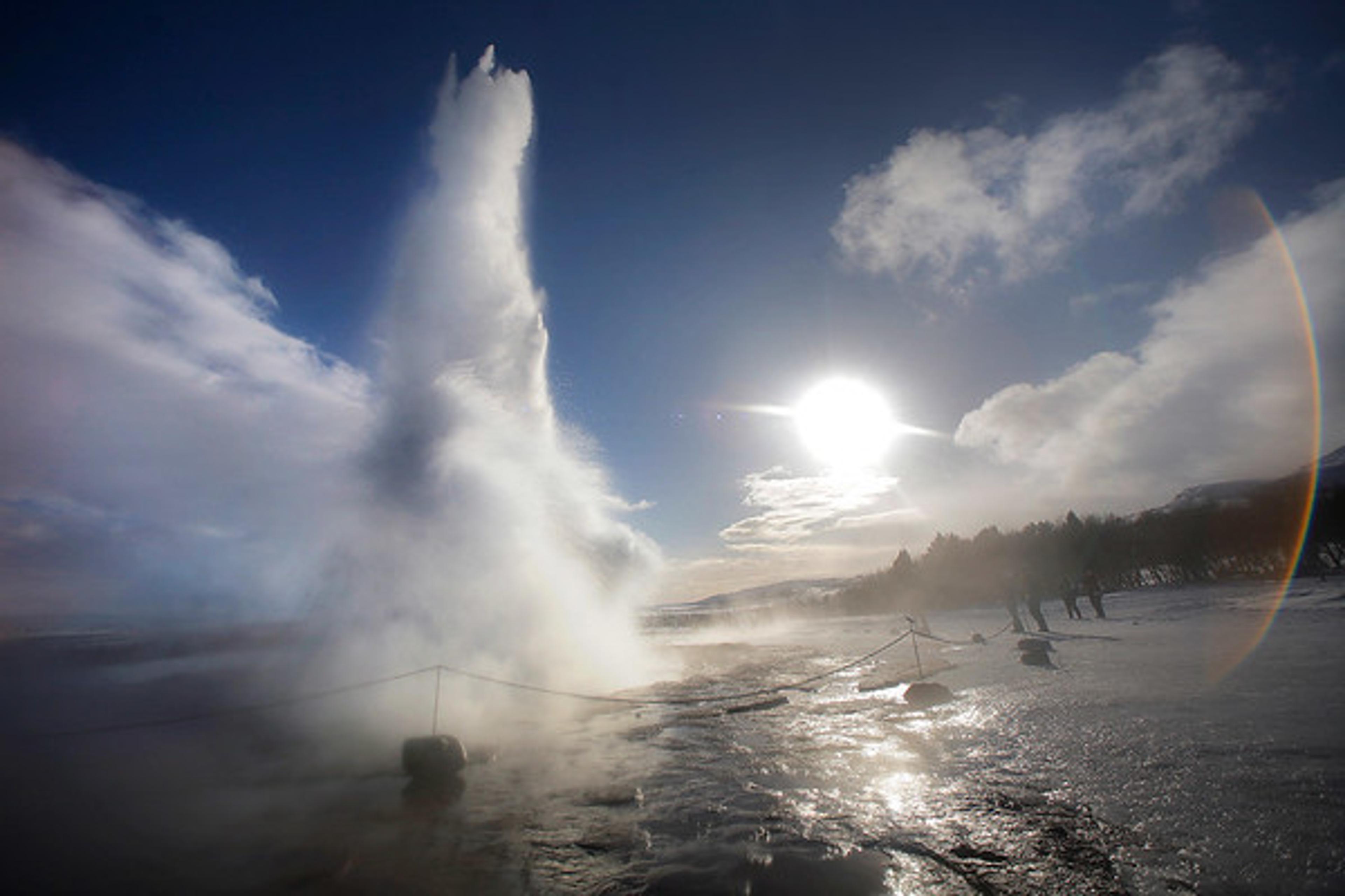 The geysir strokkur erupting and the sun shining