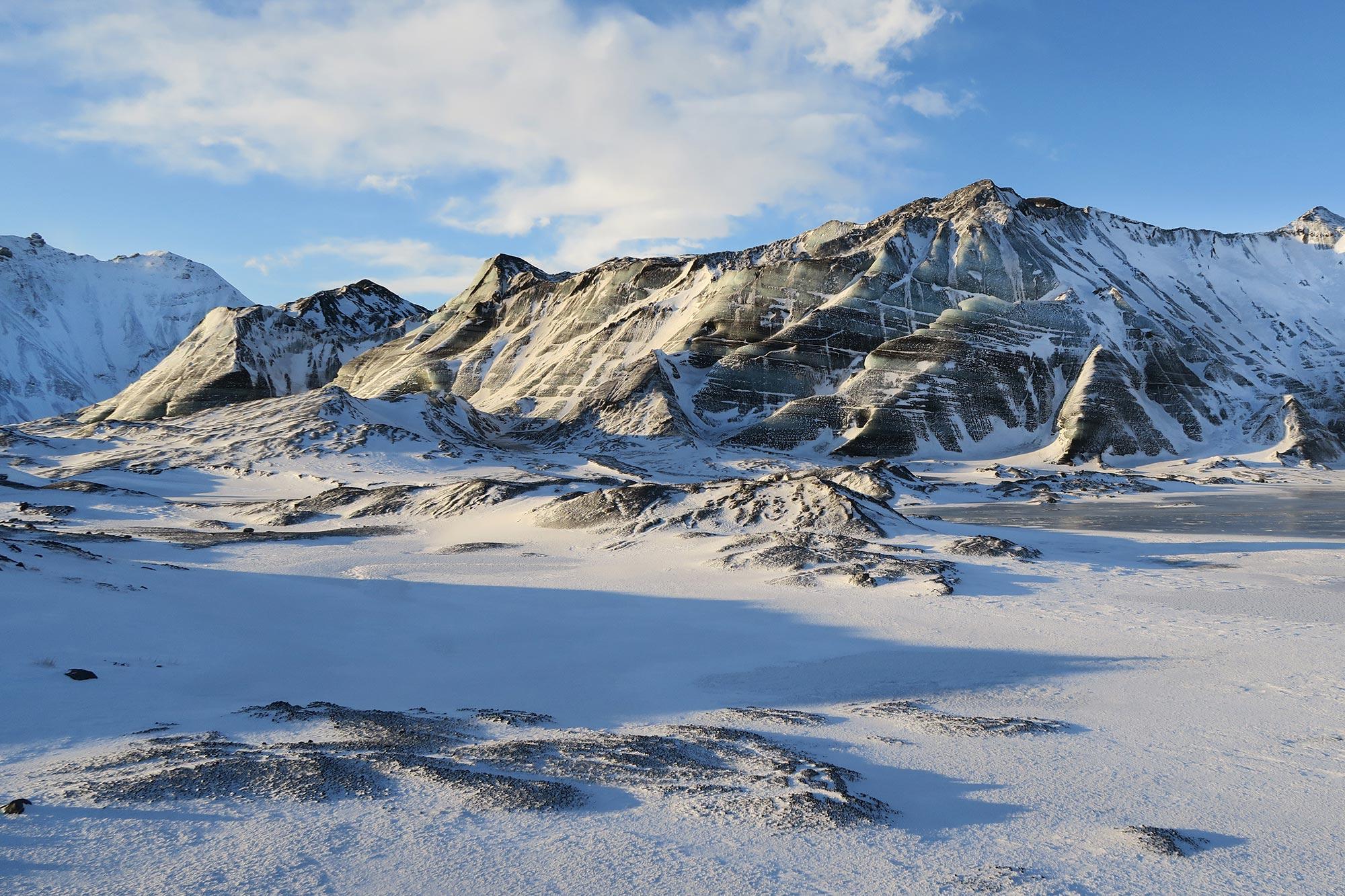snowy mountains in broad daylight in Iceland