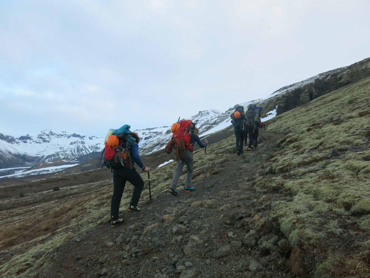 People hiking in mountains on Iceland