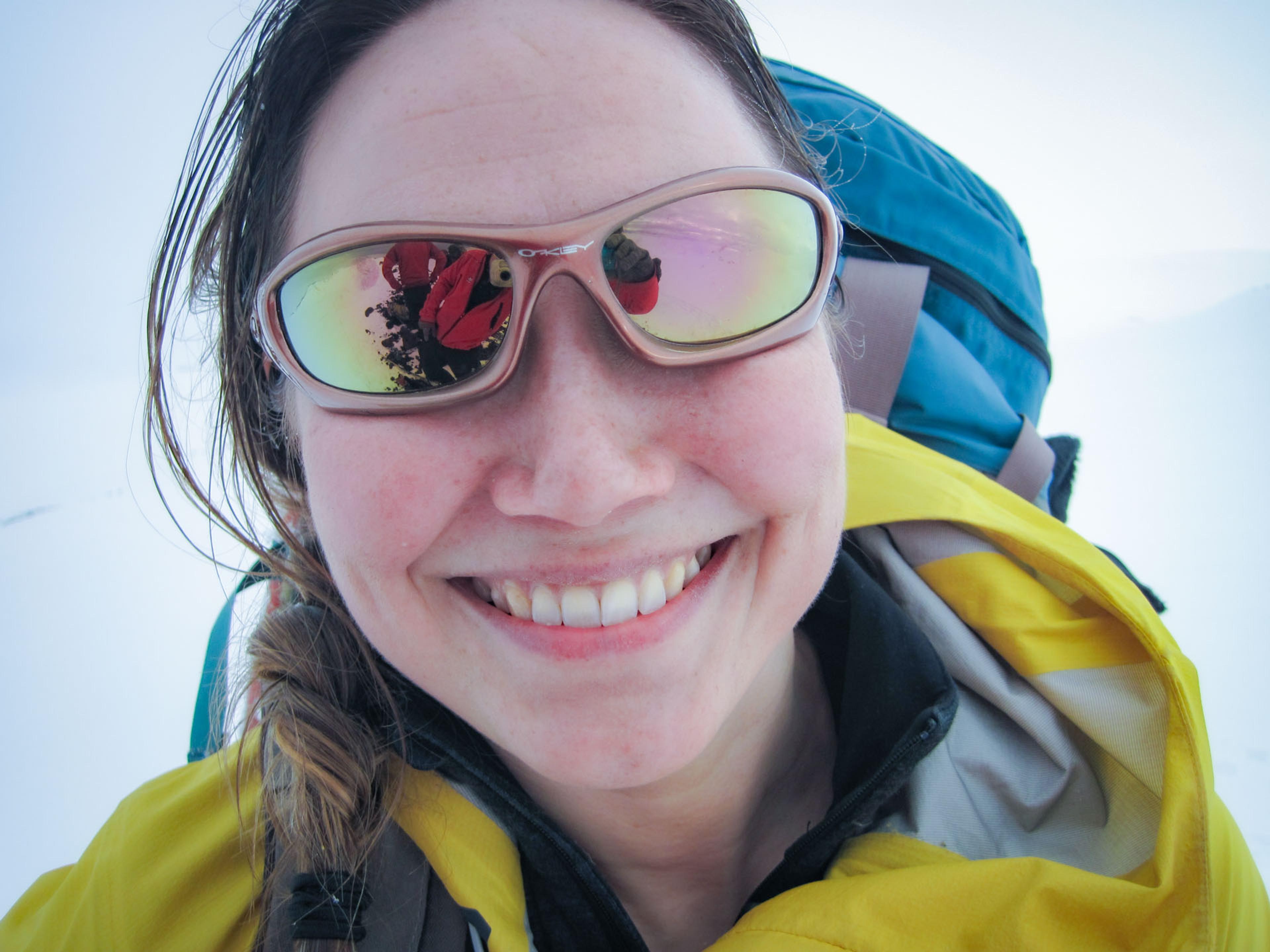 woman with stained glasses in the snow 