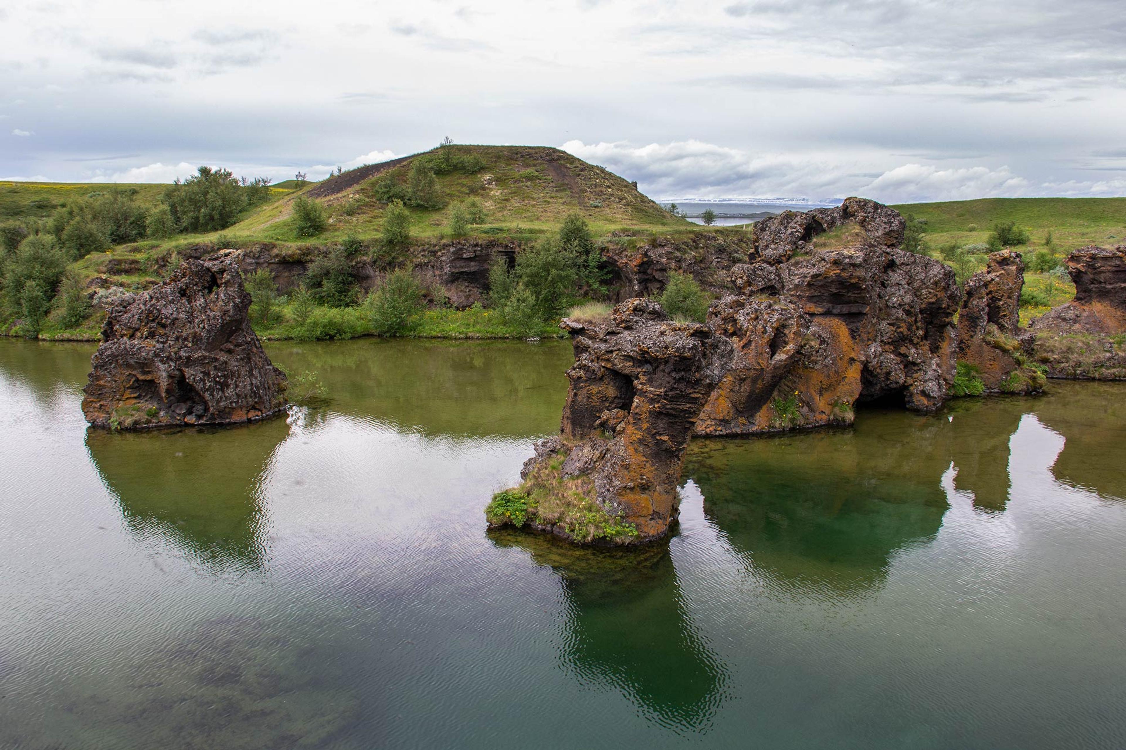 Lava formations rising out of lake Mývatn in North Iceland