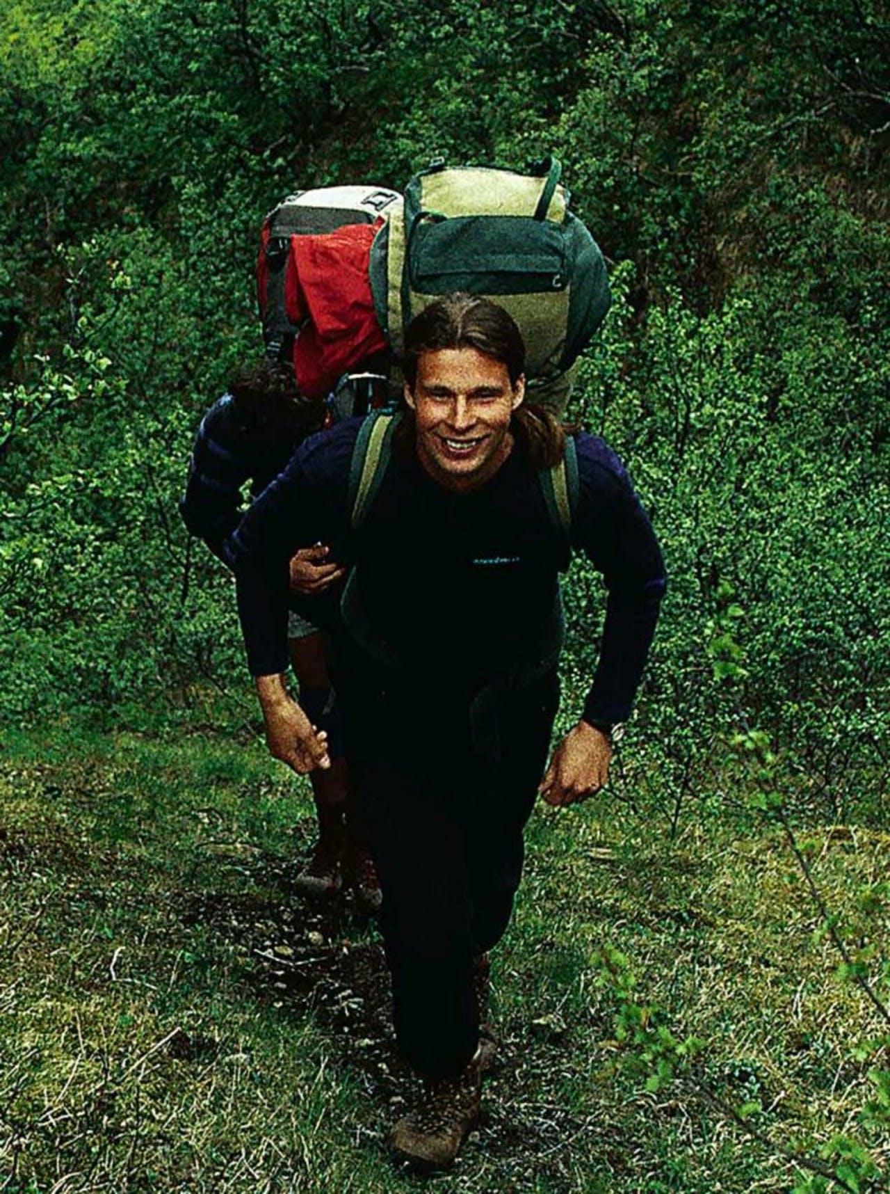 Leifur one of Icelandic Mountain Guides founder hiking in a forrest