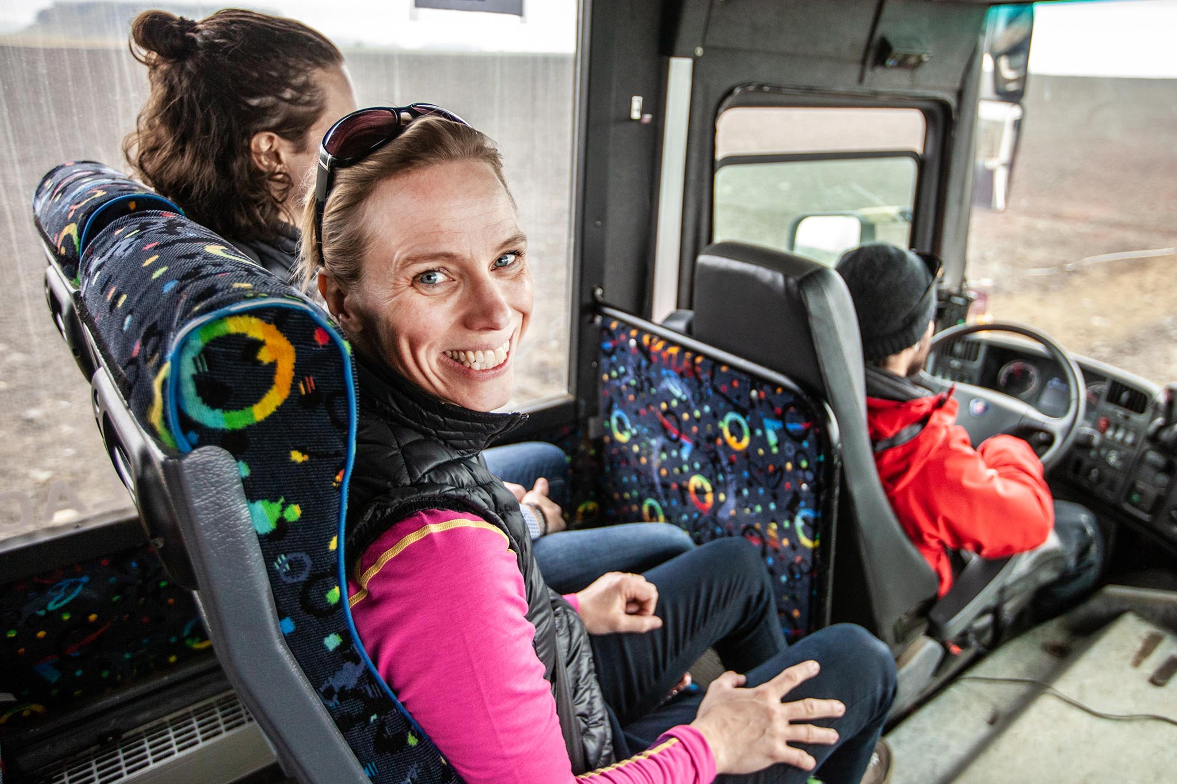 a happy woman on board the plane wreck shuttle