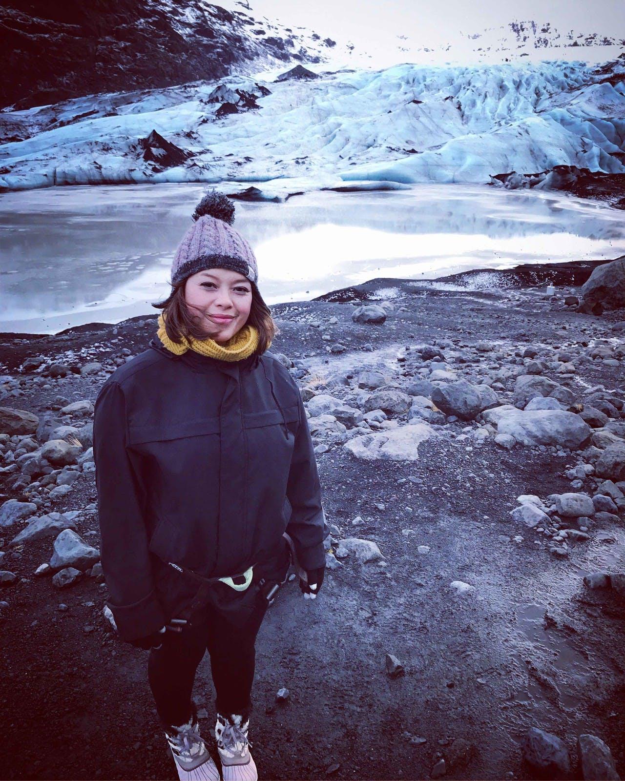 Woman standing in front of Jökulsárlón Glacier Lagoon