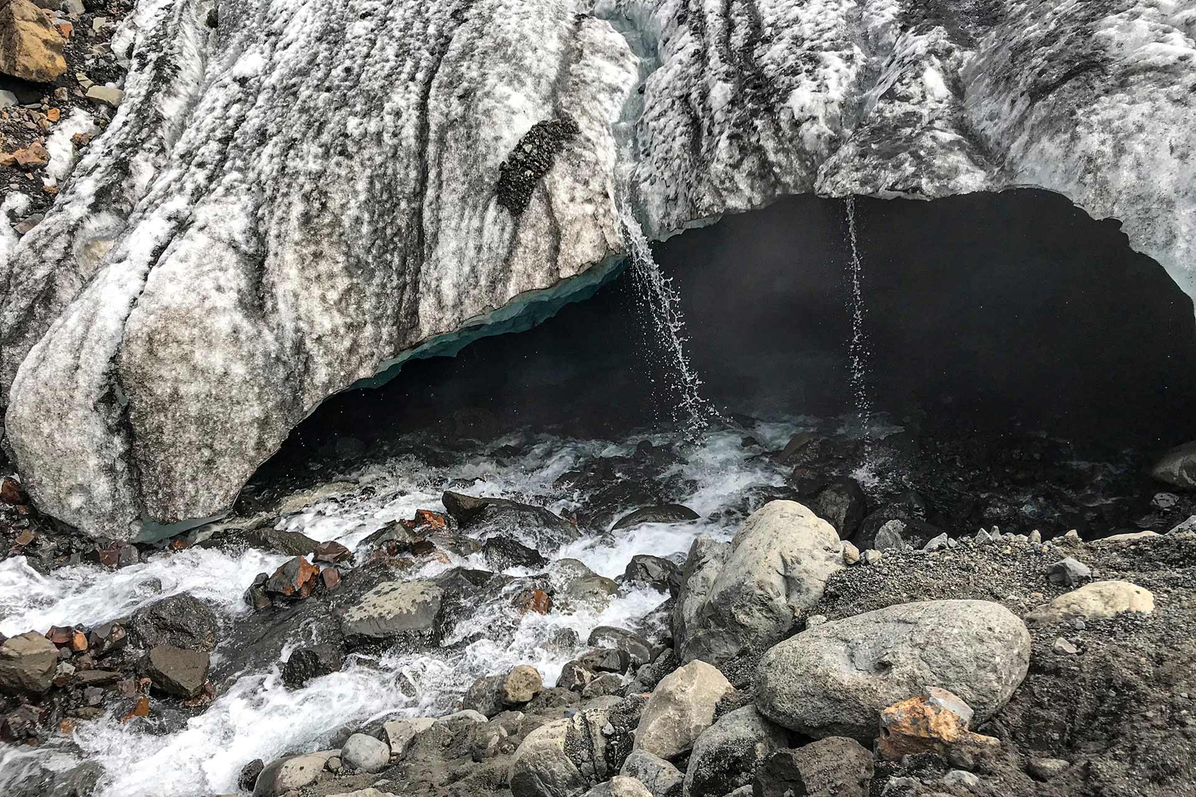 River flows inside the glacier