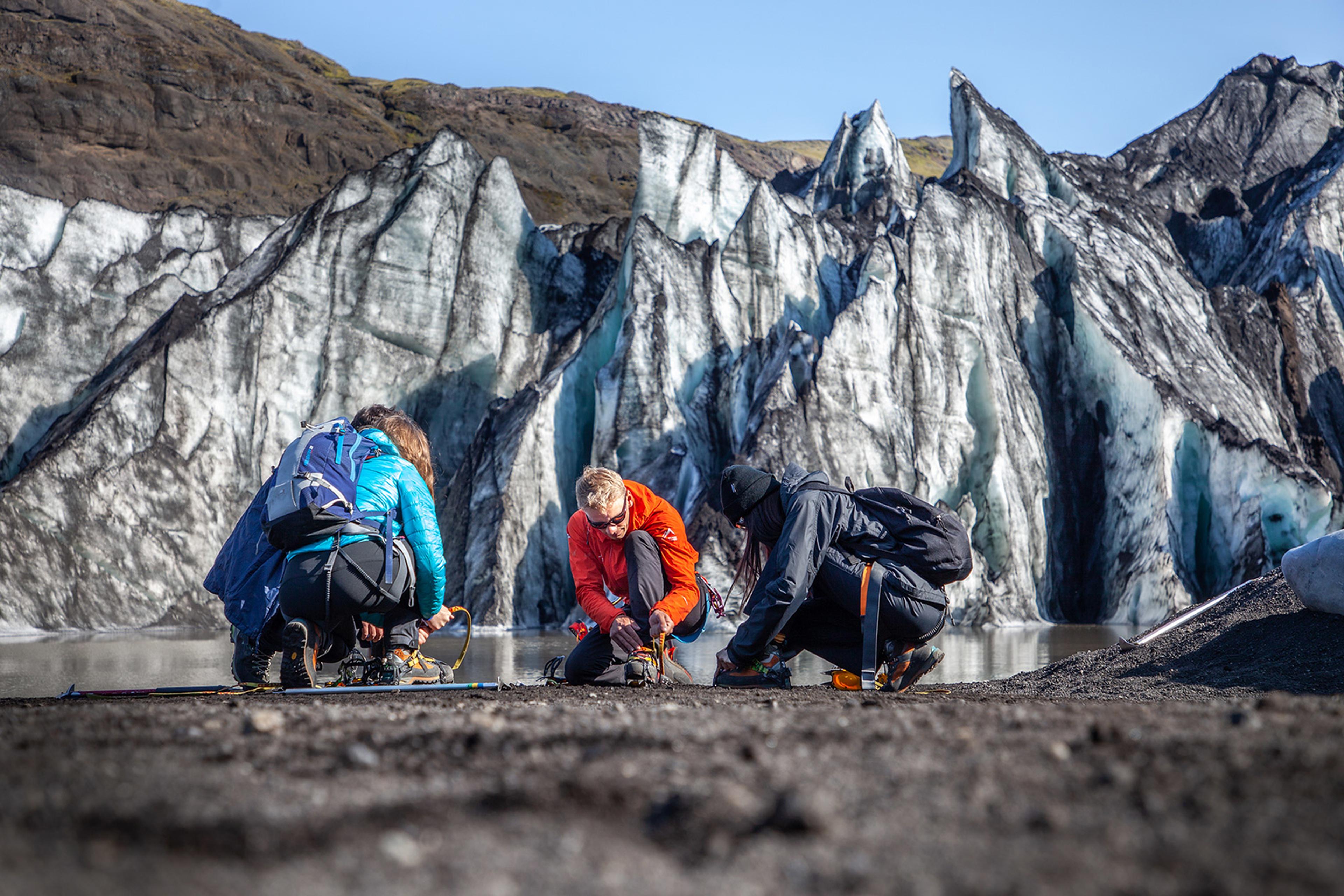 The group getting their crampons on for the glacier walk