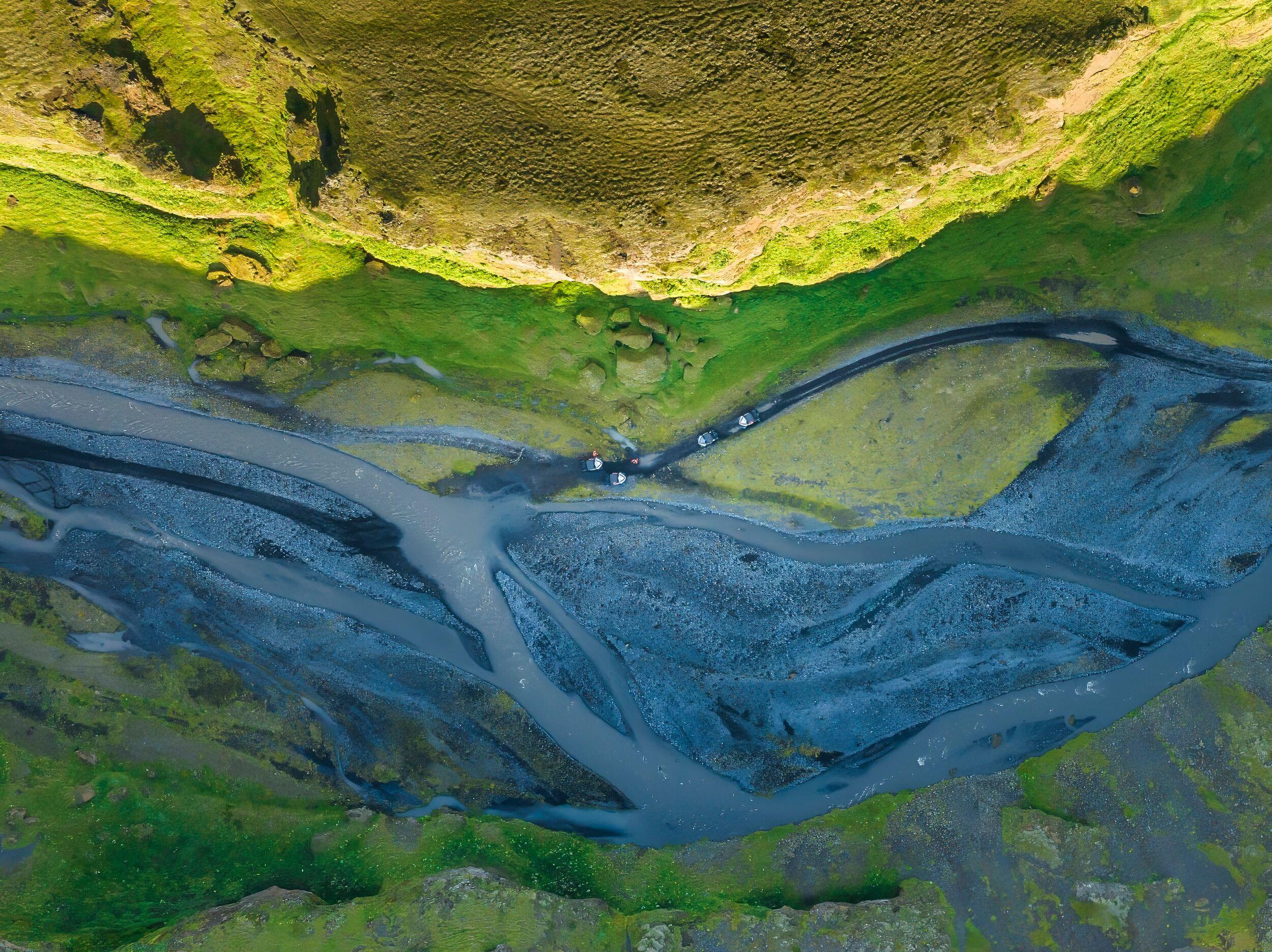 four buggy driving on a beach