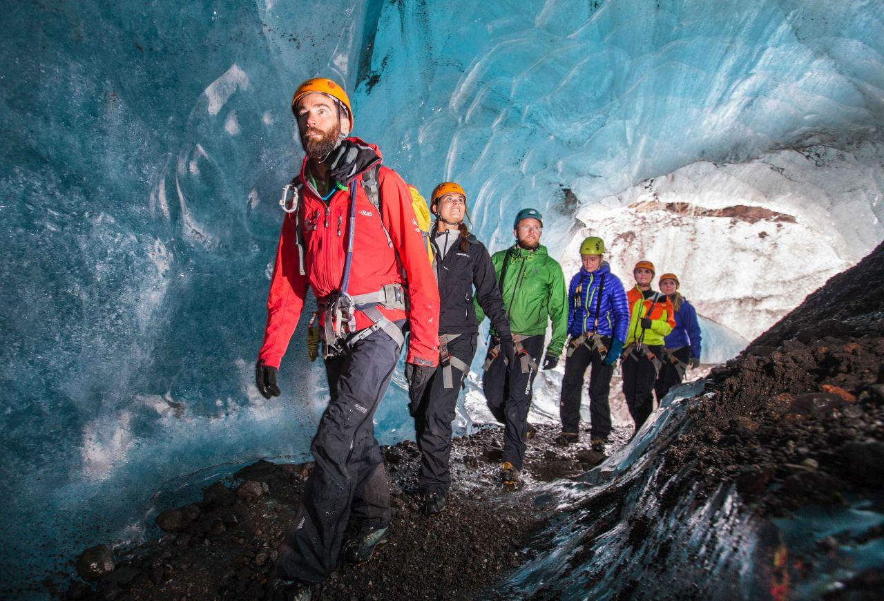 Group of people inside ice cave in Iceland