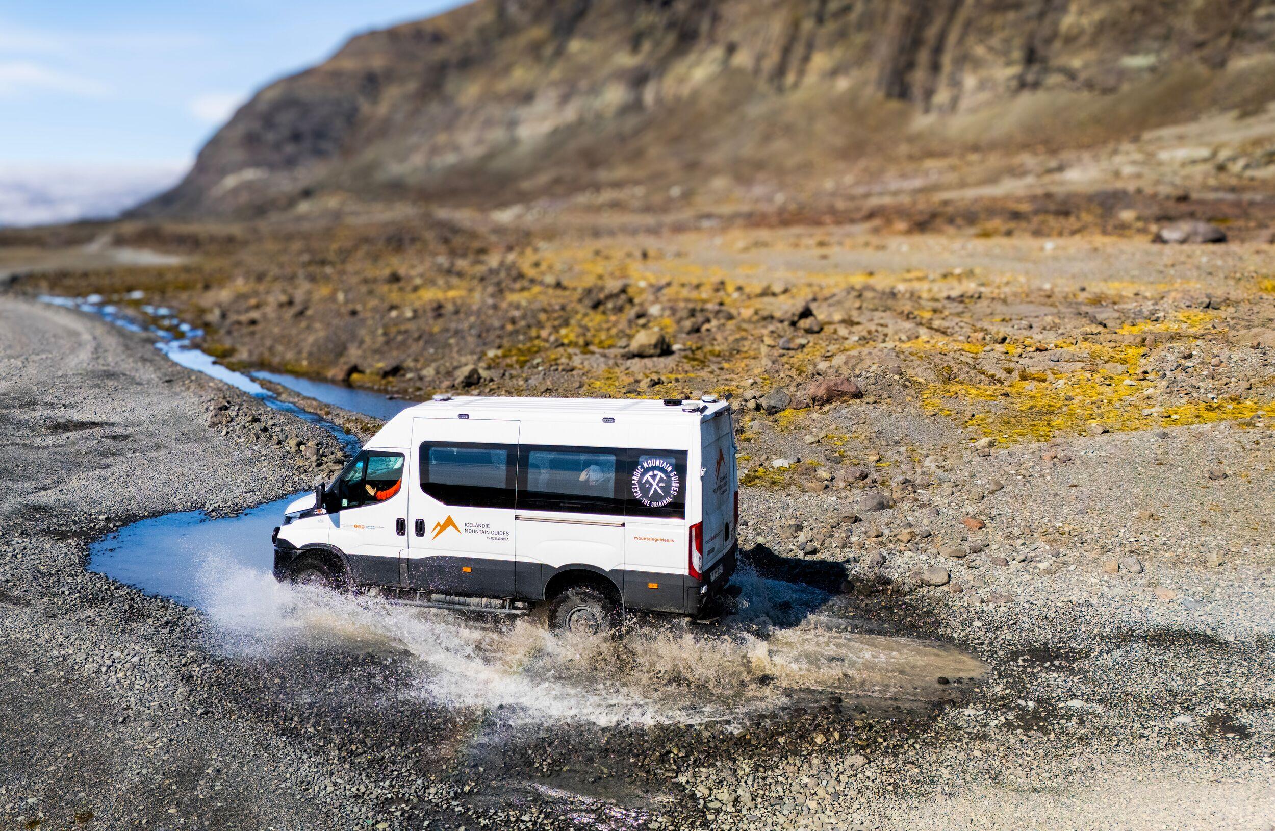 modified 4x4 vehicle driving a road to the Falljökull glacier