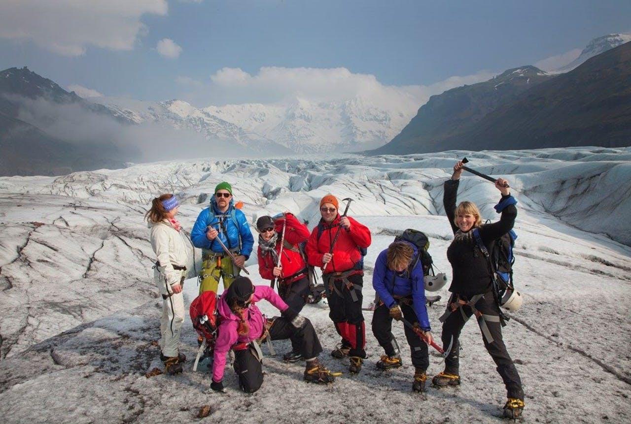 People having fun on a glacier walk in Iceland with Icelandic Mountain Guides