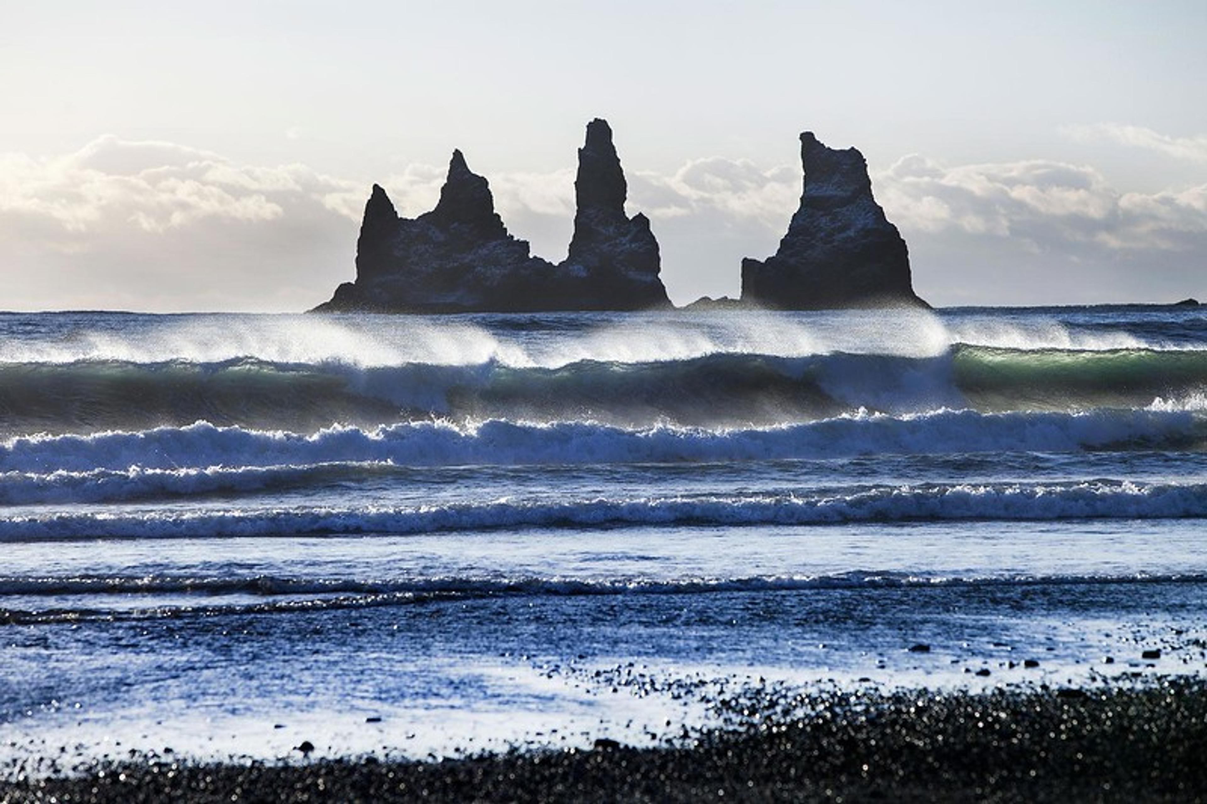 Reynisdrangar cliffs standing in the oceand close to Vík