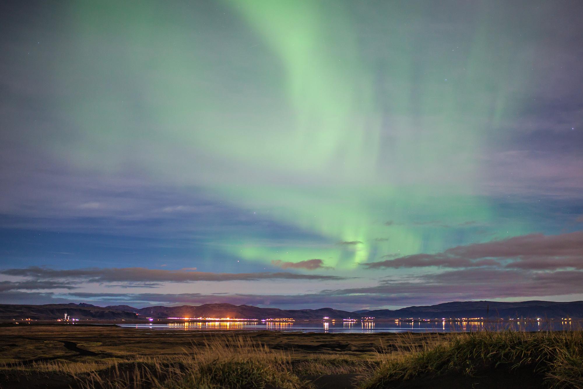 Northern lights in April over a lake in Iceland