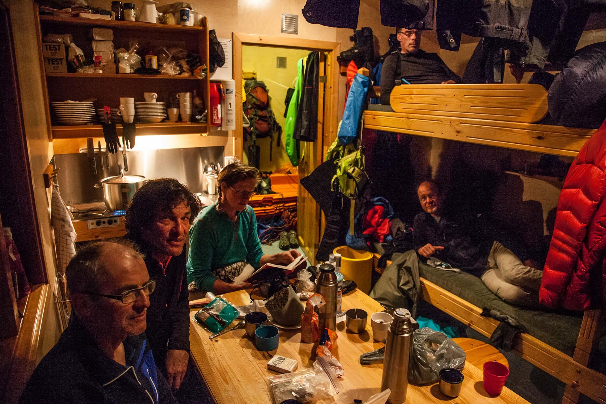 Expedition members inside the Esjufjöll mountain hut located on the southern side of Vatnajökull ice cap