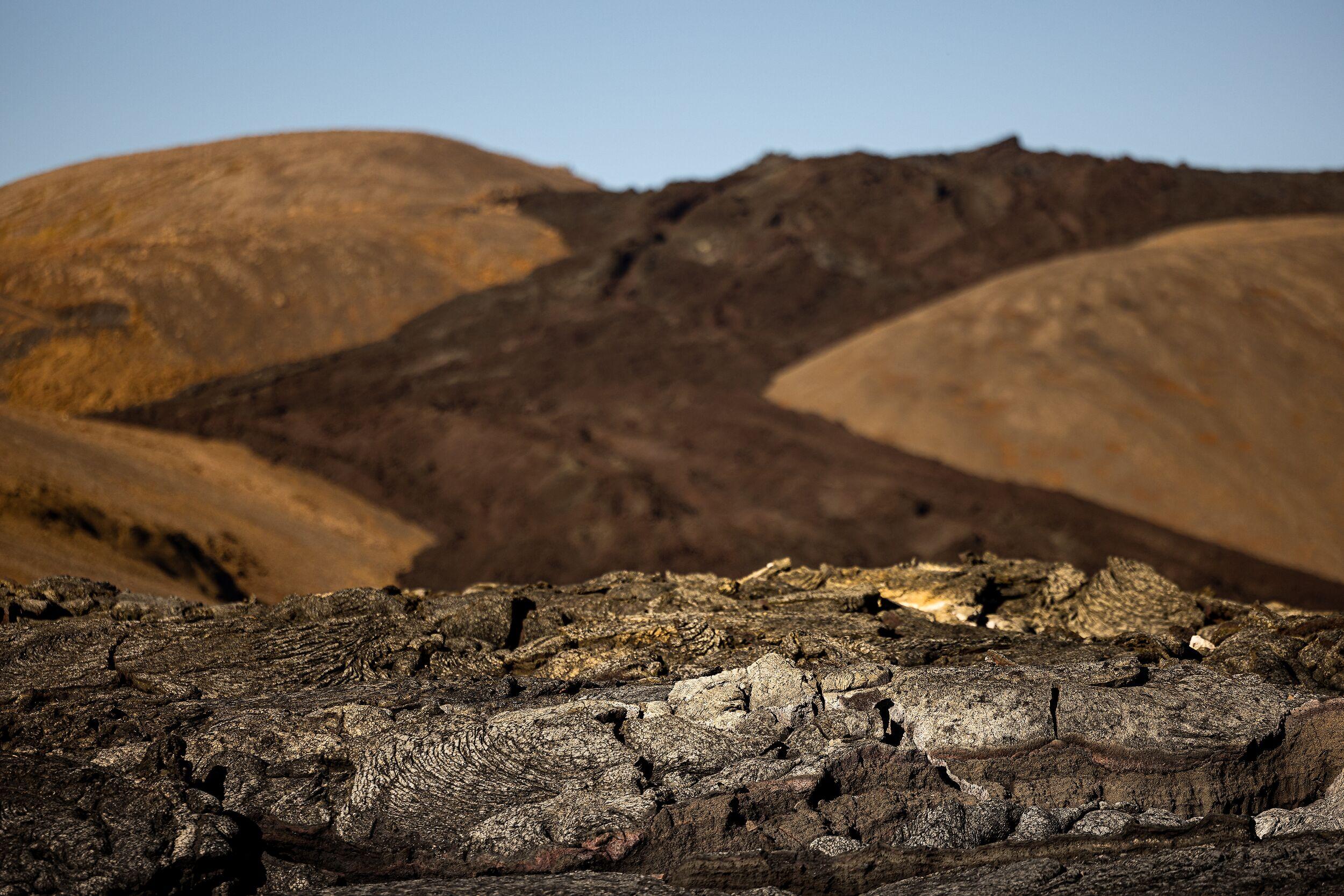 Volcanic terrain stretching towards the horizon on Reykjanes Peninsula.