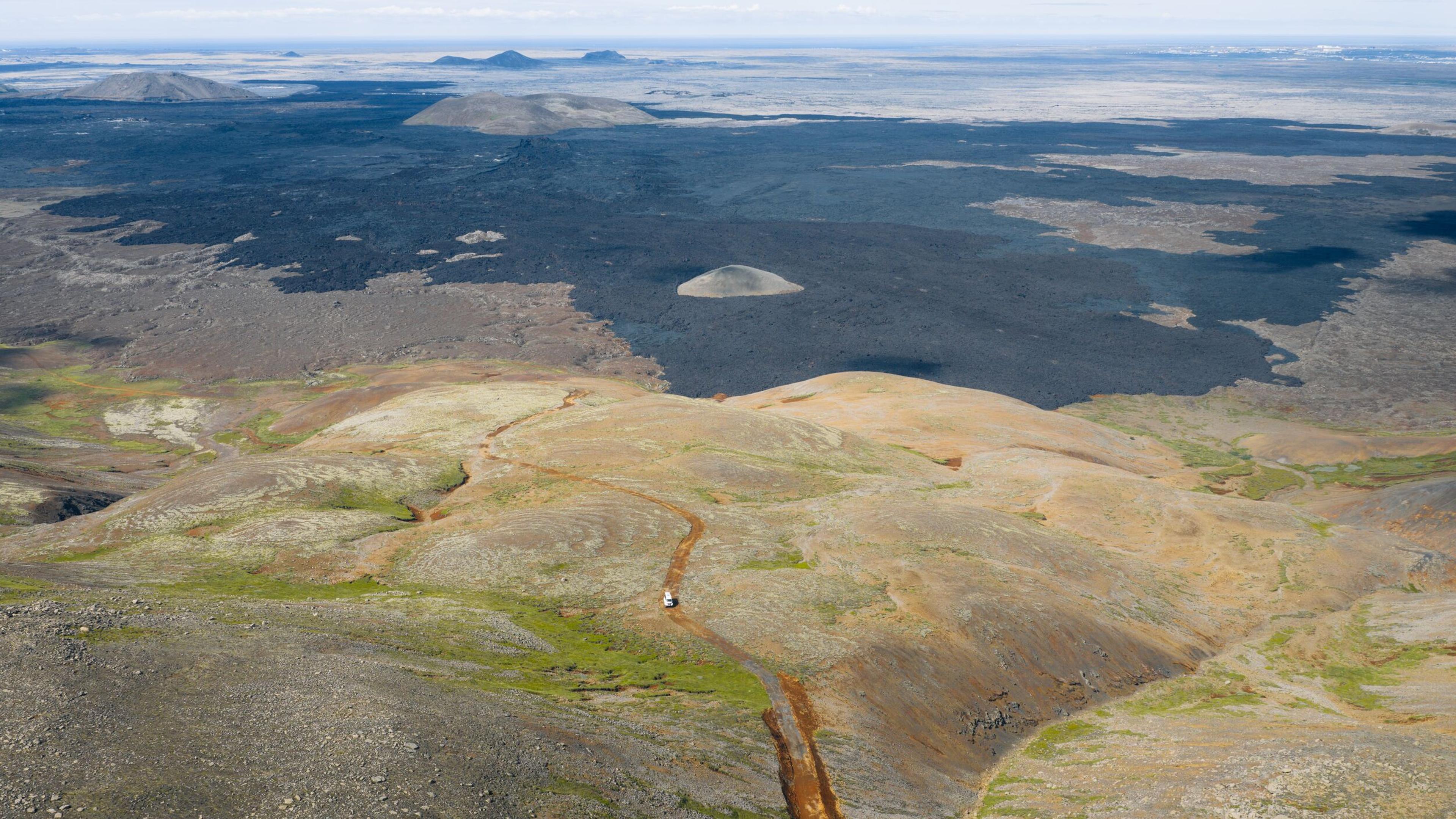 Vast panorama of a fresh lava field spread over an older lava field on Iceland's Reykjanes Peninsula
