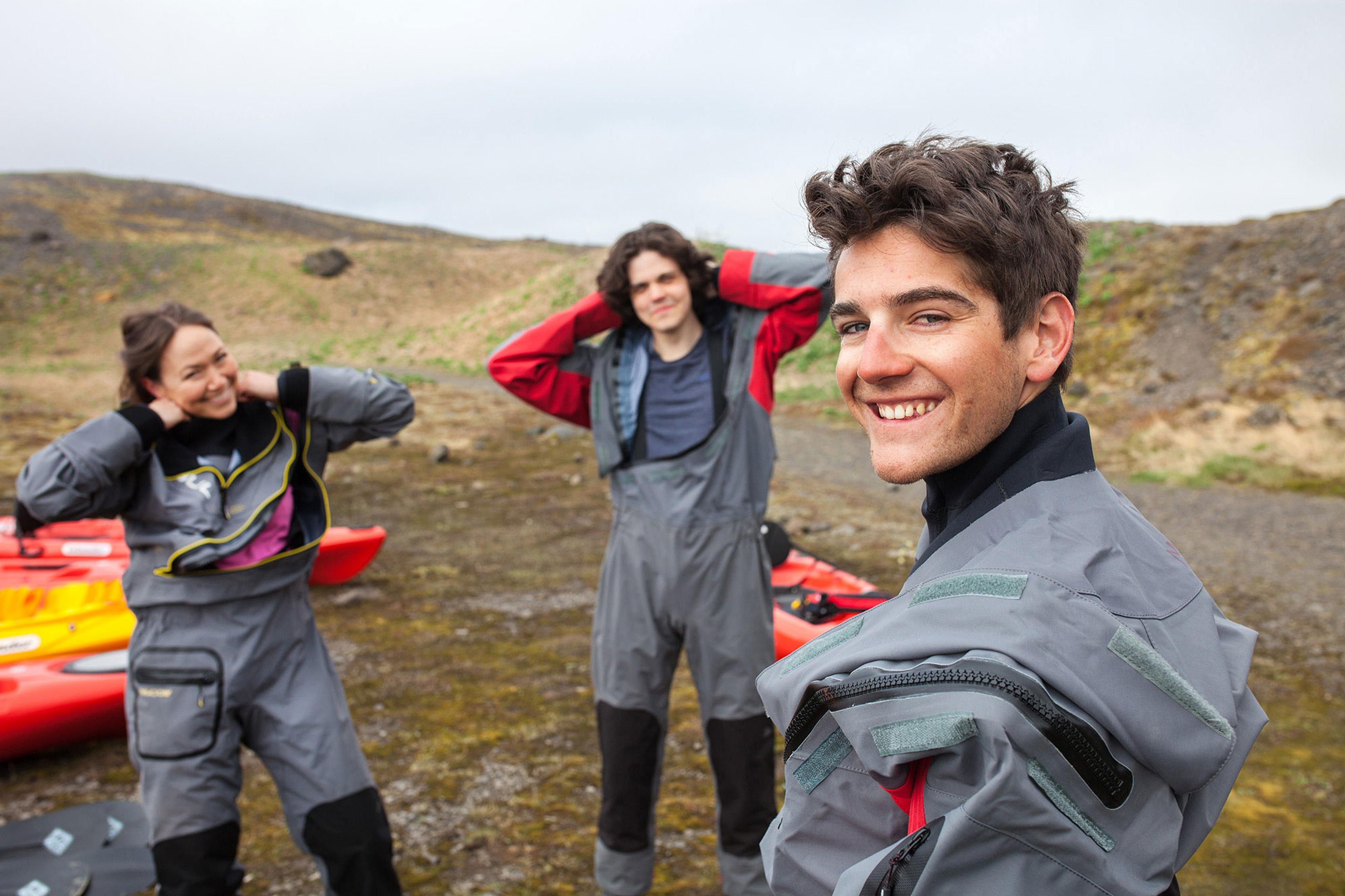 People dressing up for a kayak tour by Sólheimajökull