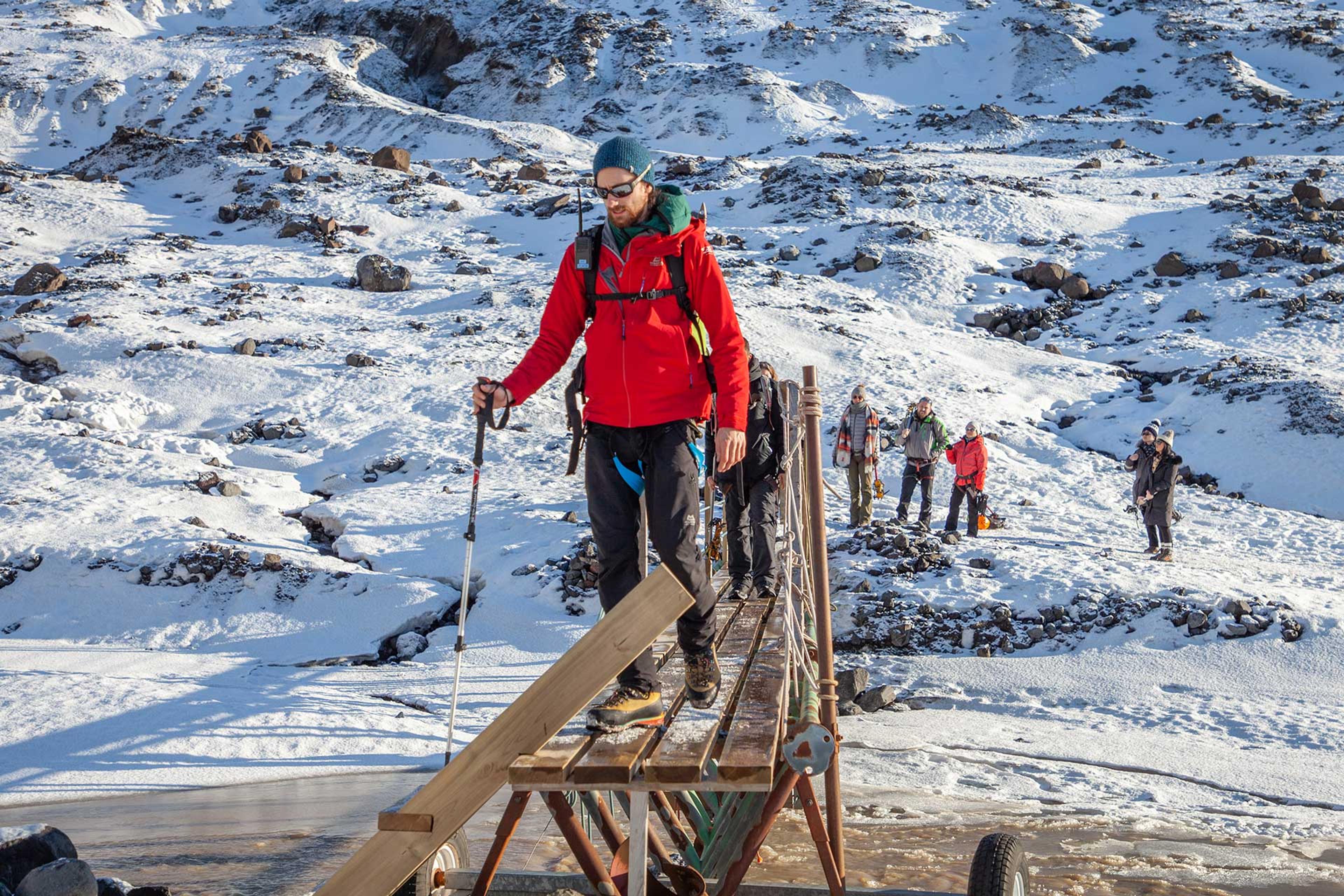 Bridge over a glacial river on Falljökull Glacier