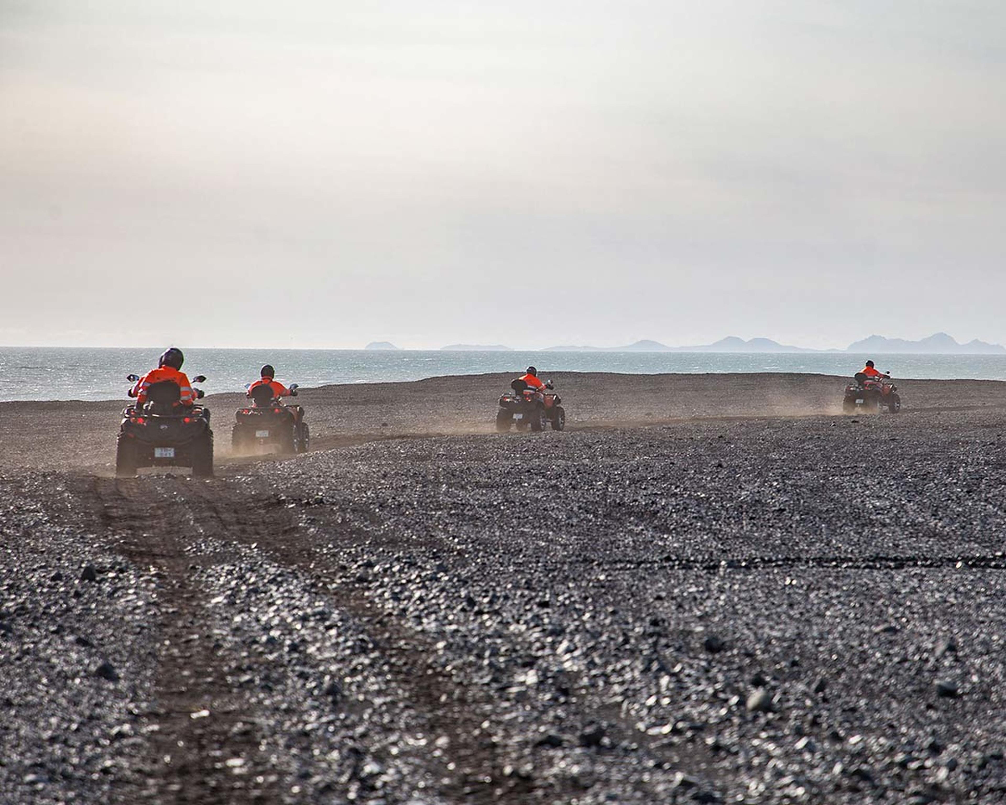 Dust flying about in the wind as the atv quads drive by