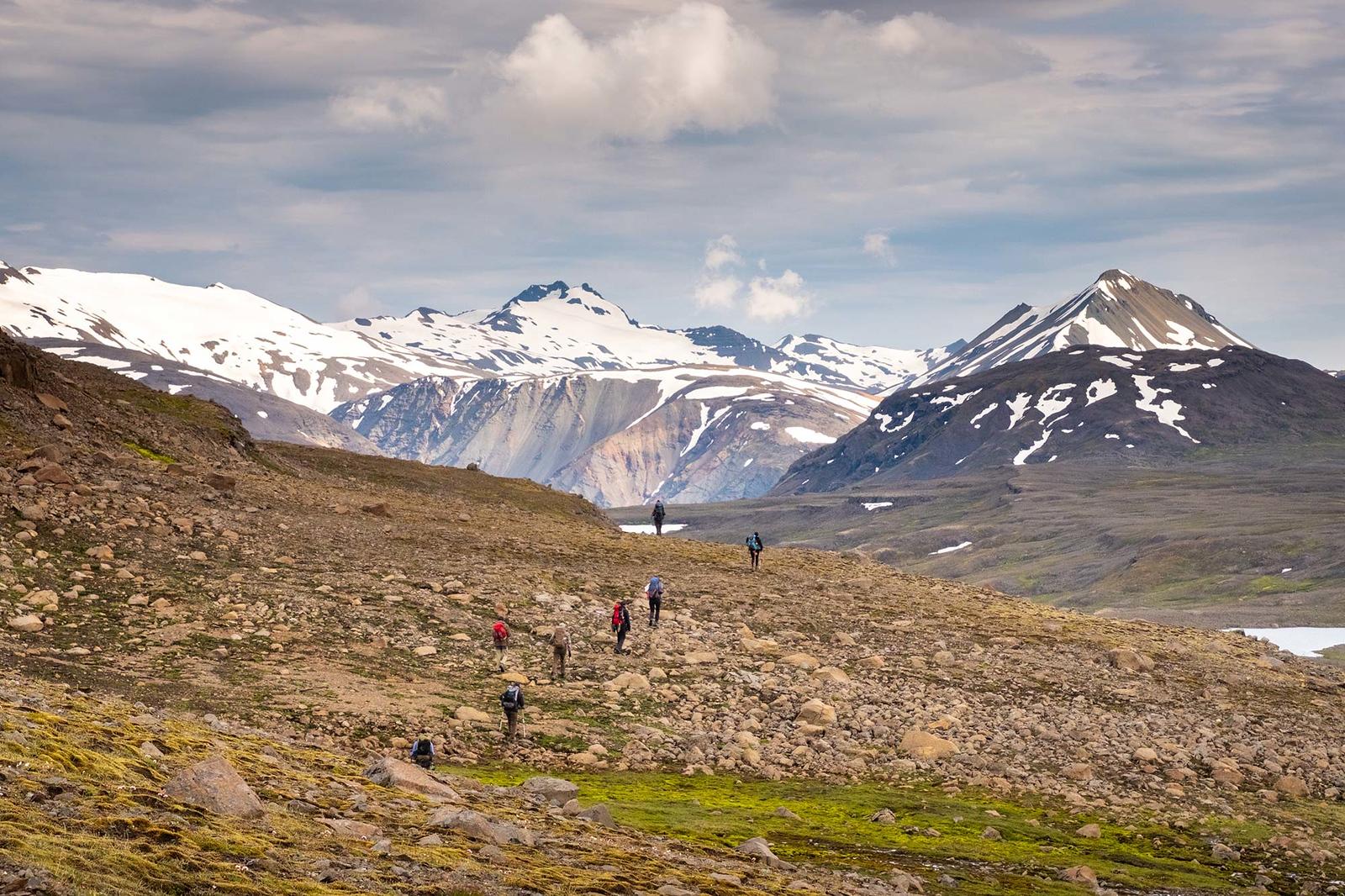 Hikers in Lonsoraefi area and mountains in the background