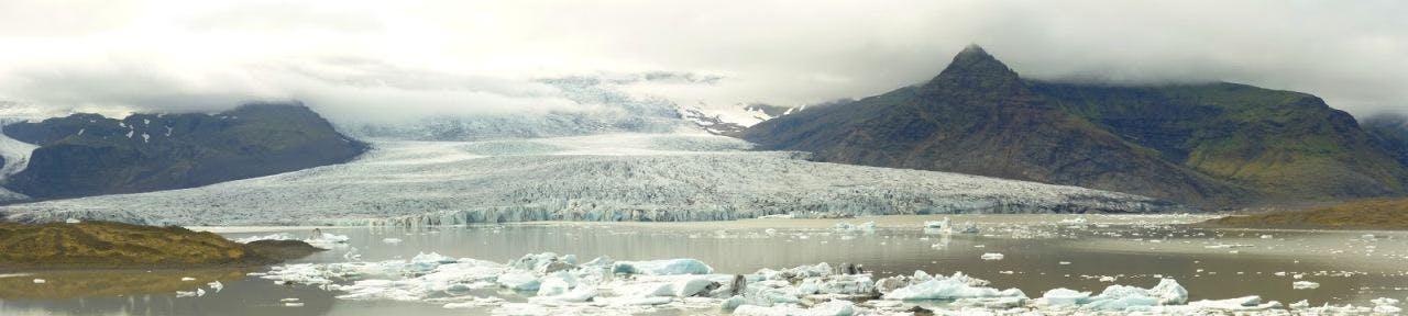 Fjallsárlón Glacier Lagoon with a cloudy sky