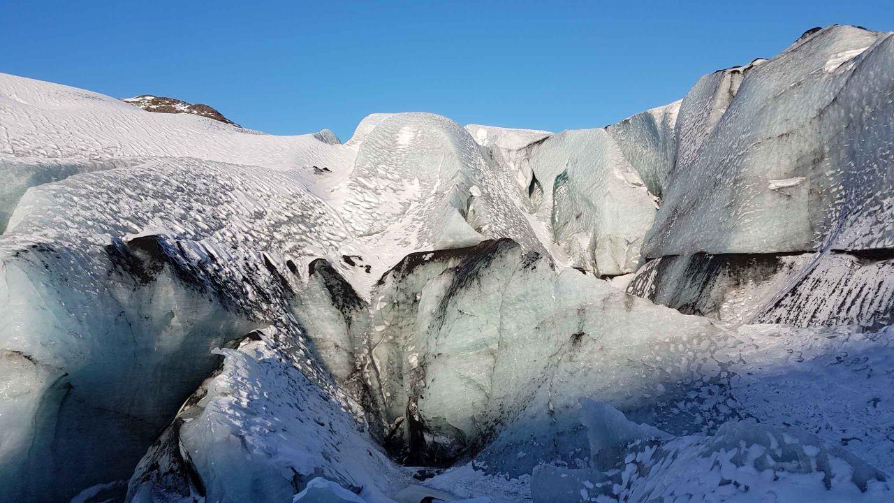 Dramatic formations of Sólheimajökull outlet on sunny day